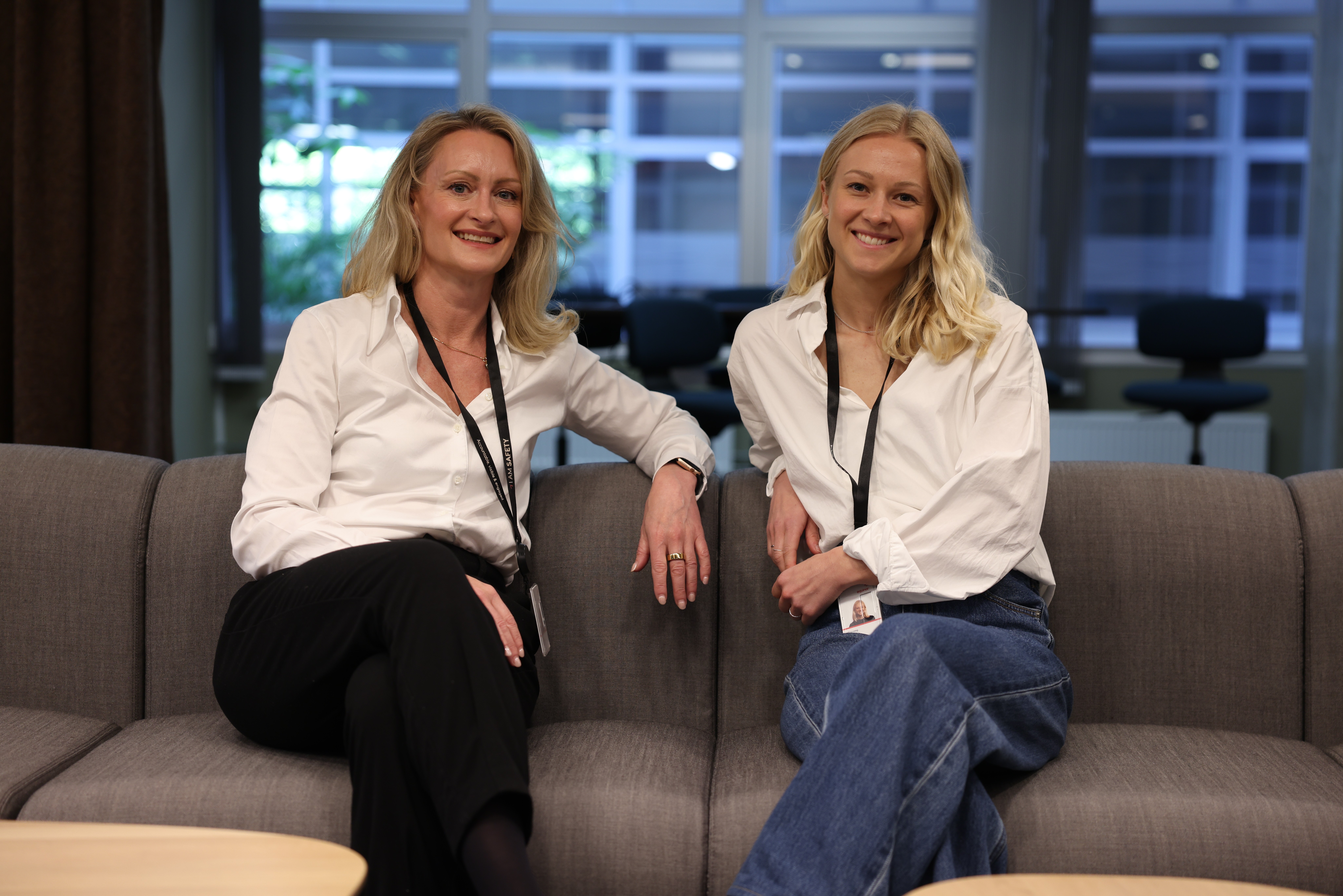 Two women in office smiling
