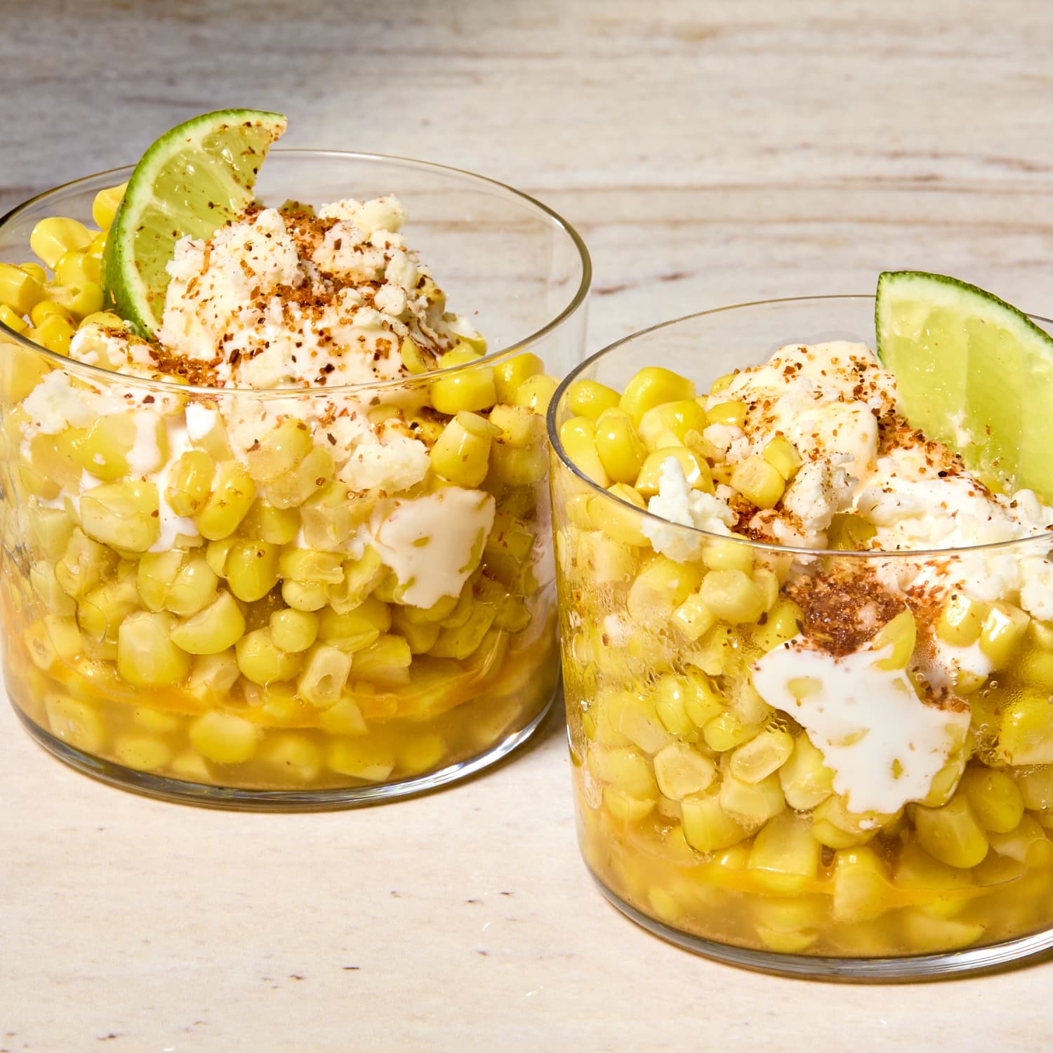 Boiled corn with mayonnaise and cheese.