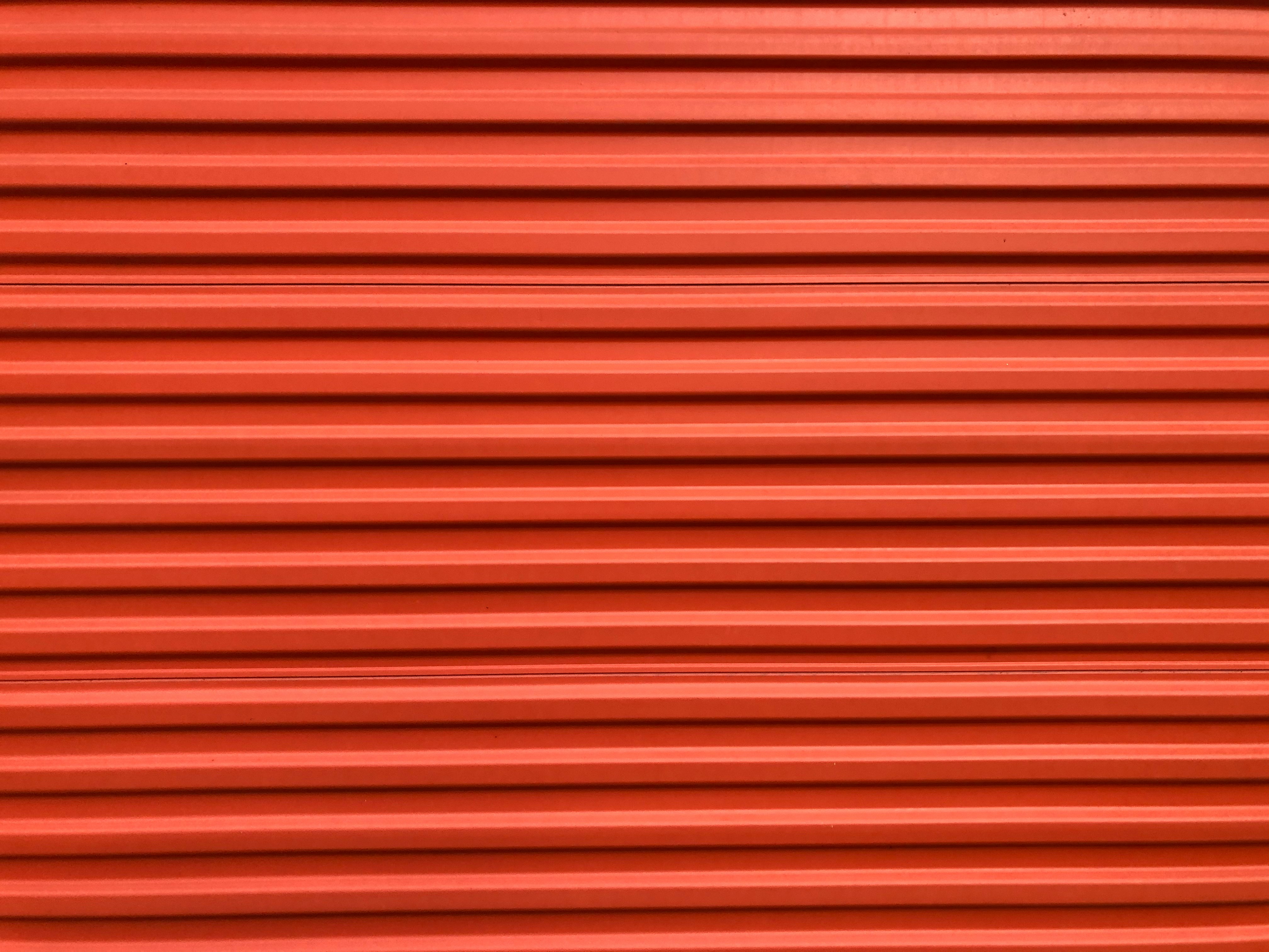 red and black striped textile