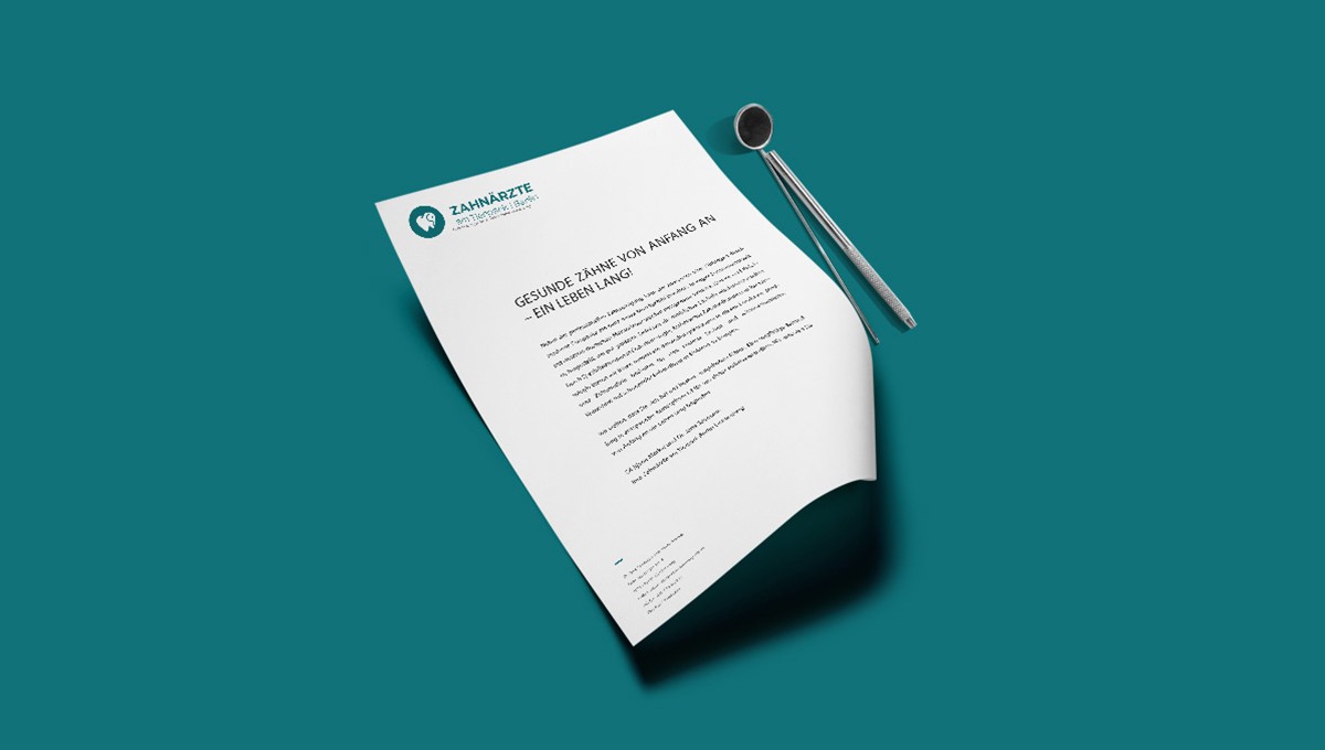 Family standing in a lush green field with tractor.