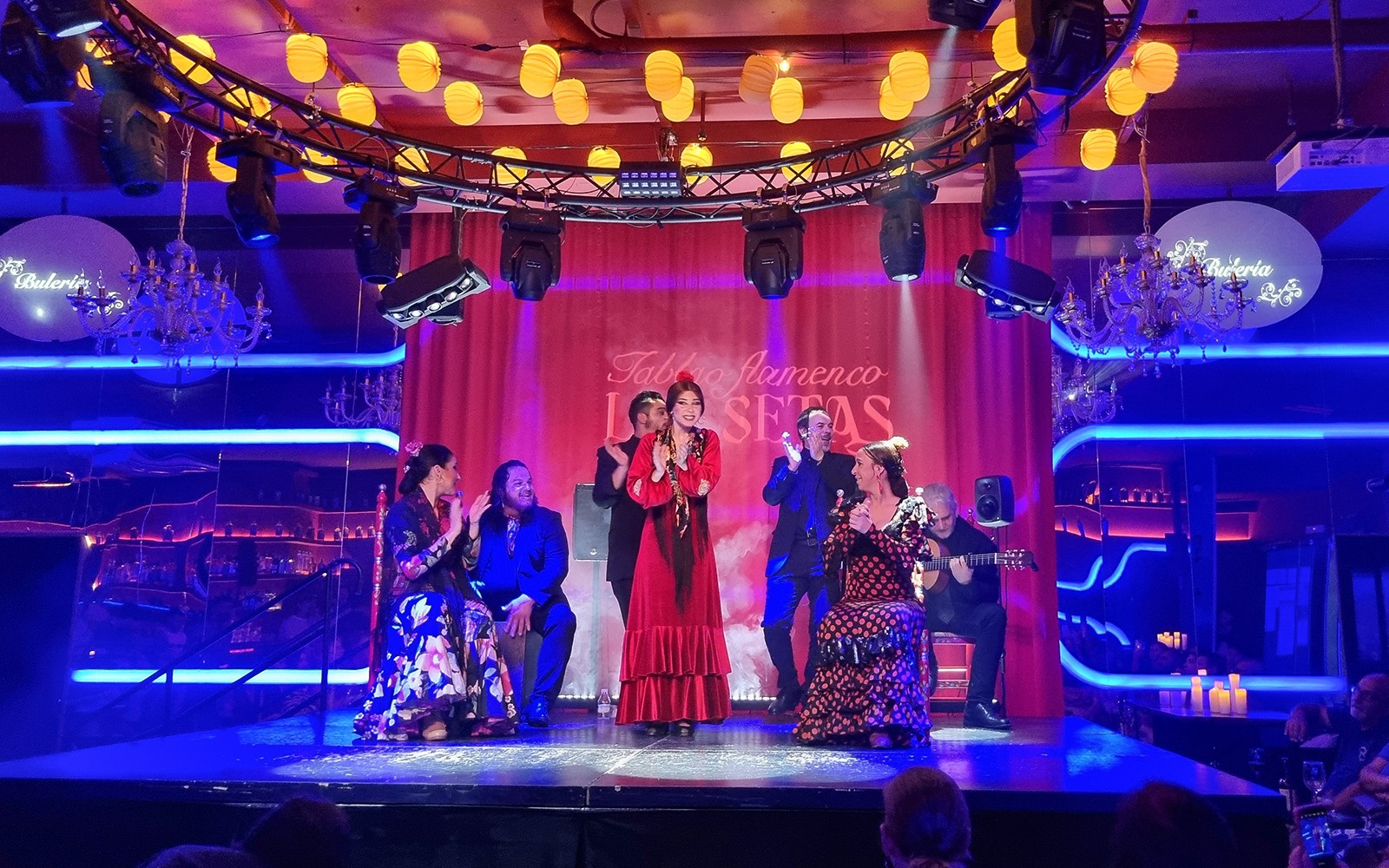 Flamenco performers on stage at Las Setas in Seville, Spain.