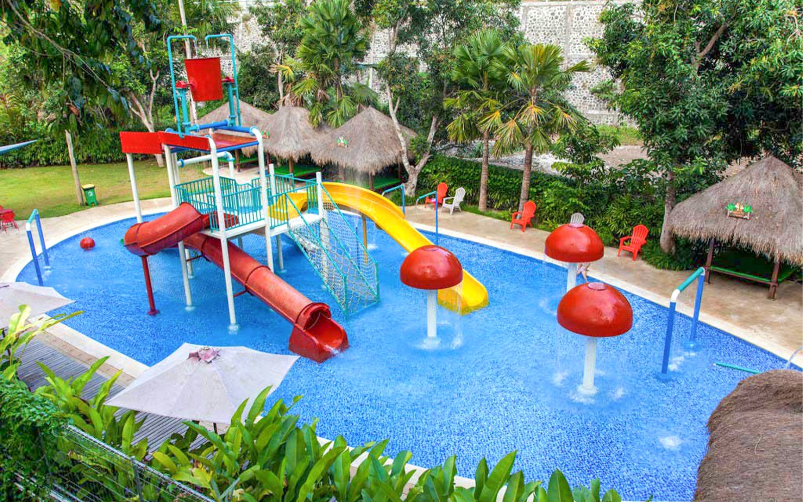 Children's water play area with slides at Bali Zoo.