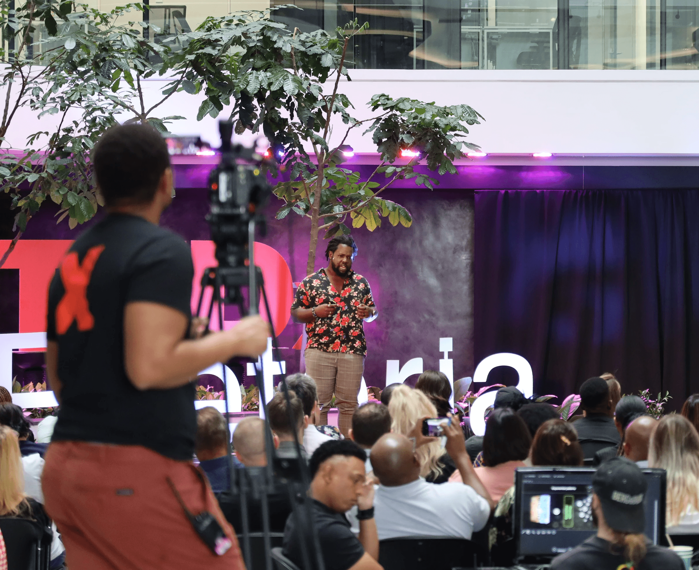 boy in black long sleeve shirt sitting on chair in front of black flat screen tv