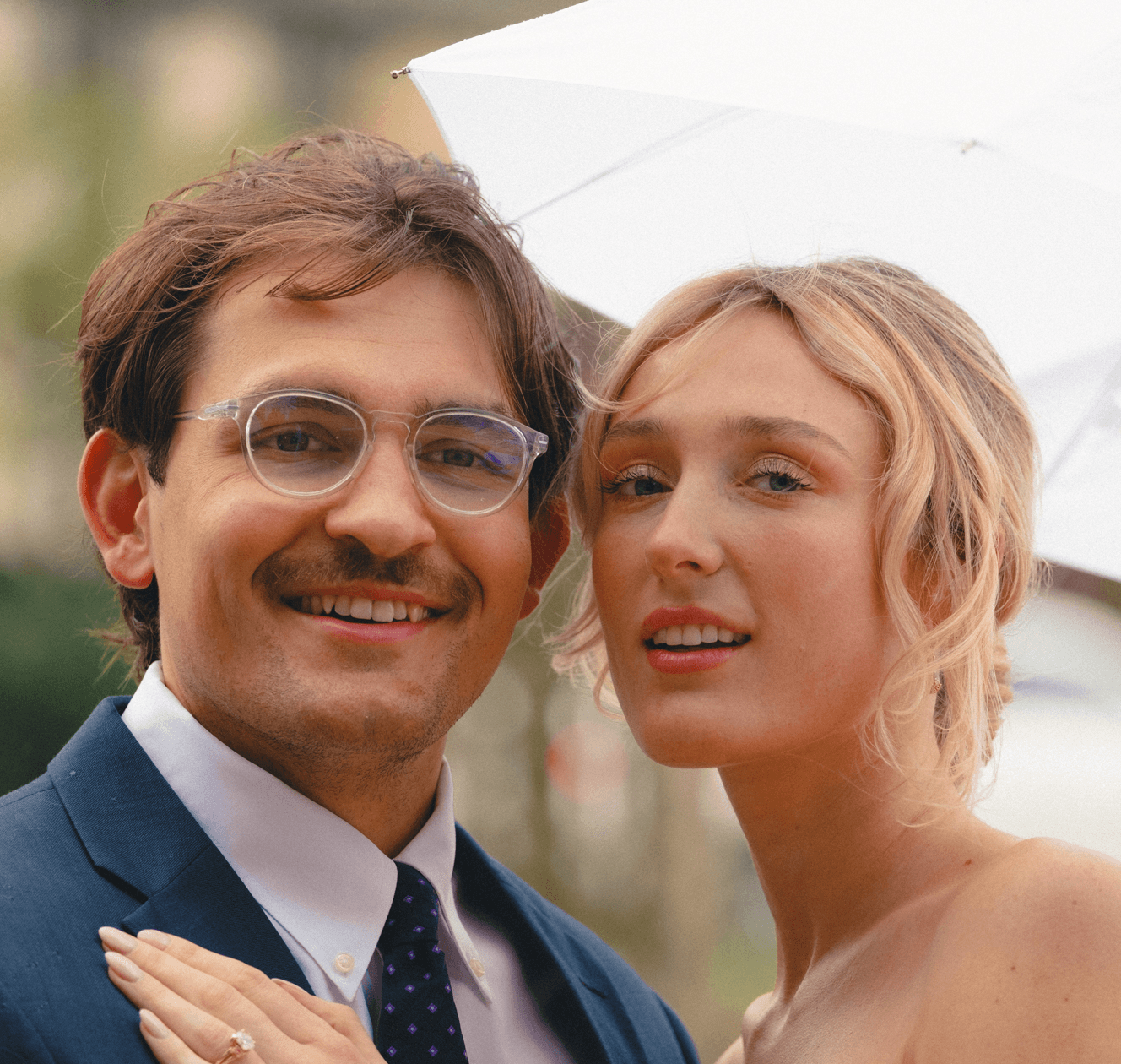 Couple smiliing at camera