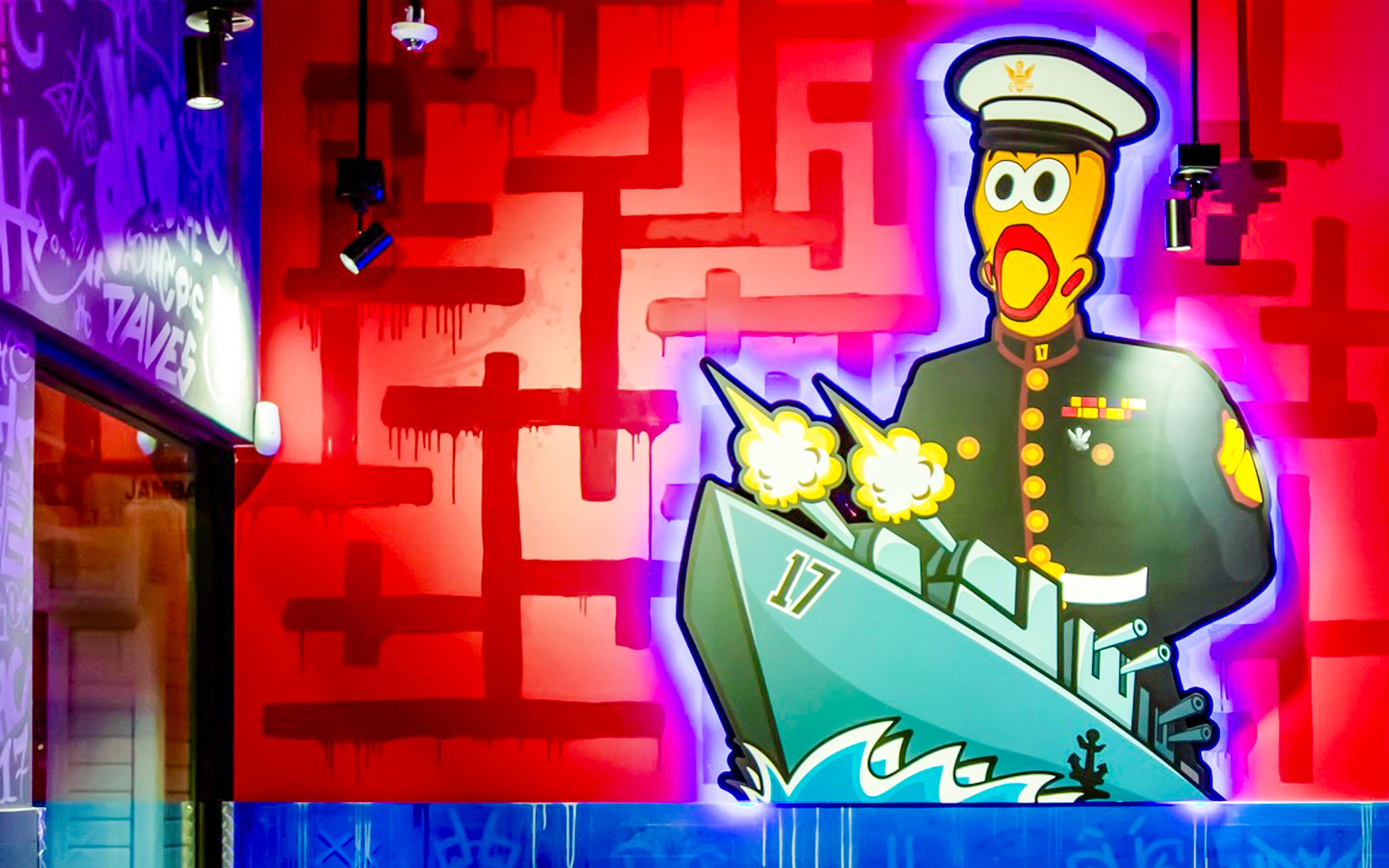 Custom Navy-themed Dave’s Hot Chicken character mural inspired by Port Hueneme’s coastal military culture.