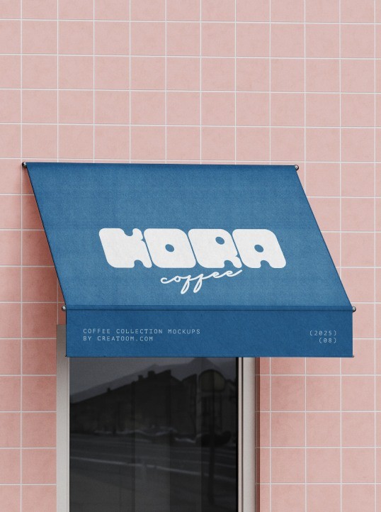Blue shop awning with a coffee logo on a pink tiled wall