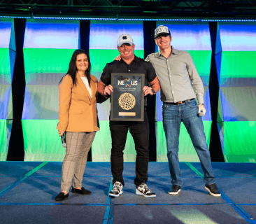A Man Talking using Microphone in the Conference Room