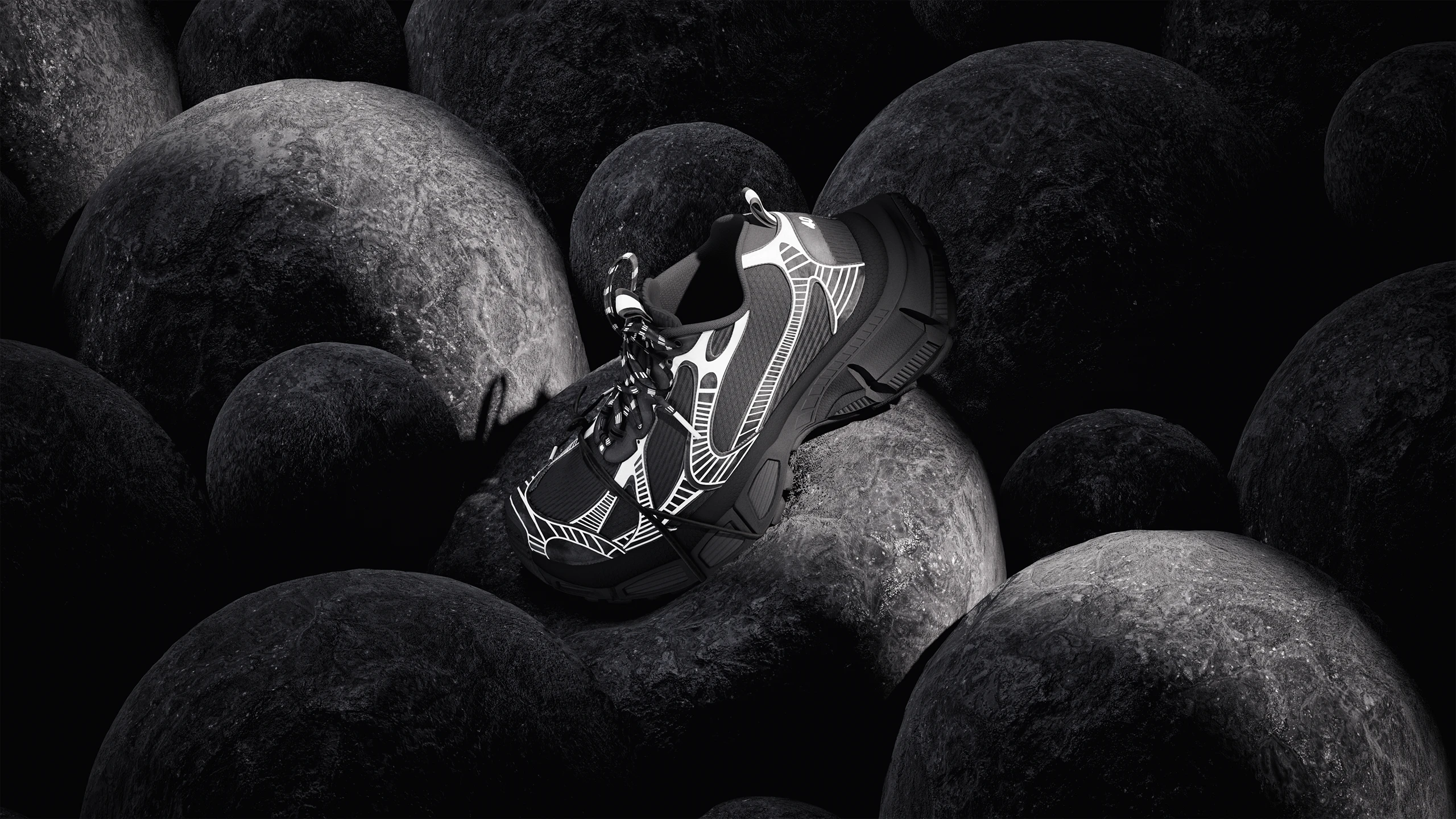 Balenciaga sneaker 3D render resting on dark boulders, black and white