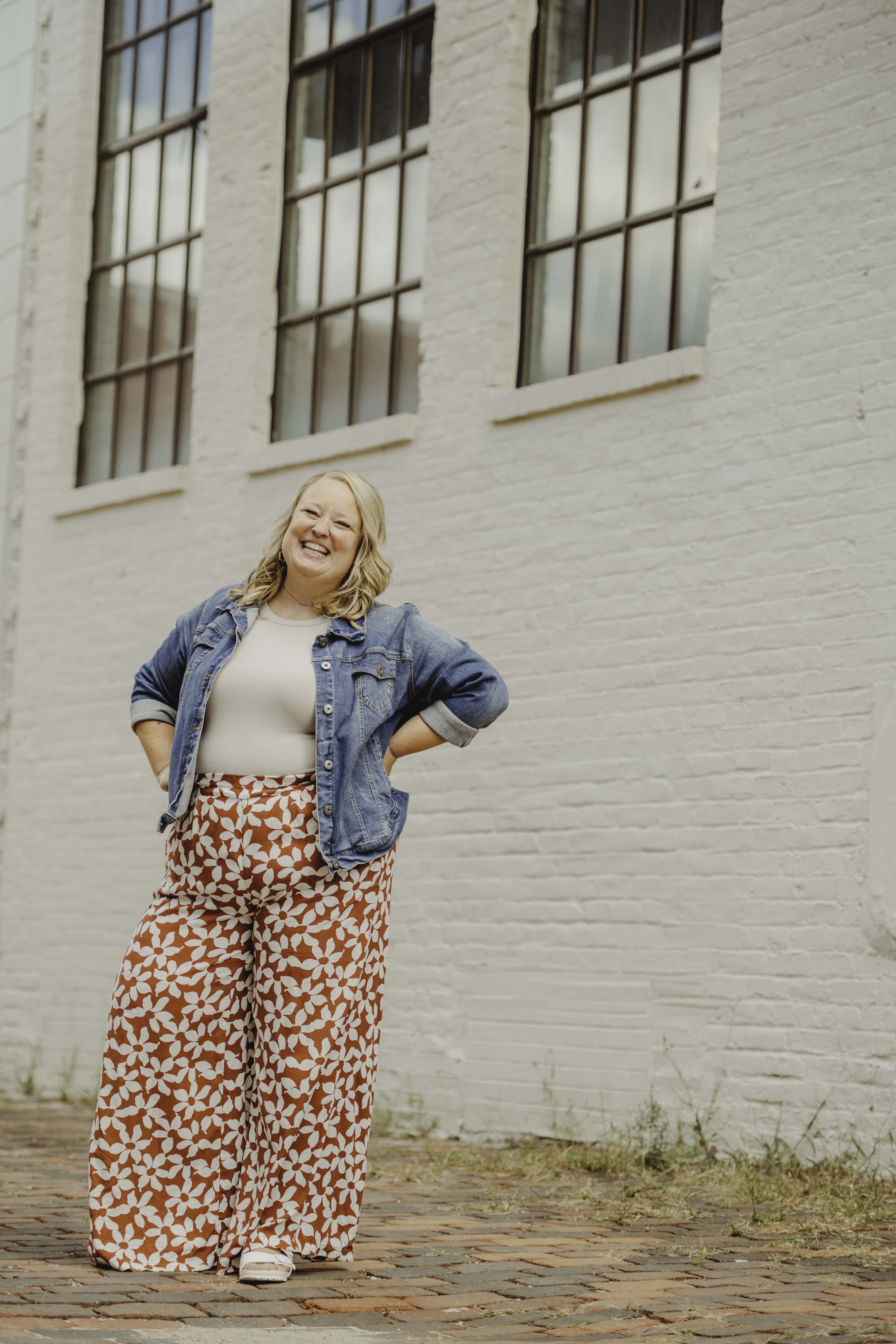 Students are working on laptops in a classroom