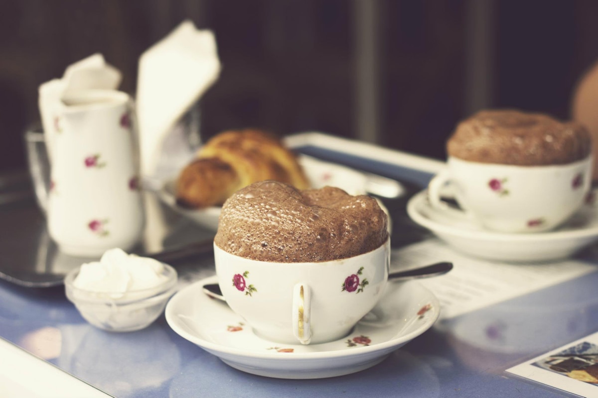 Tea cups and saucers in a traditional setting
