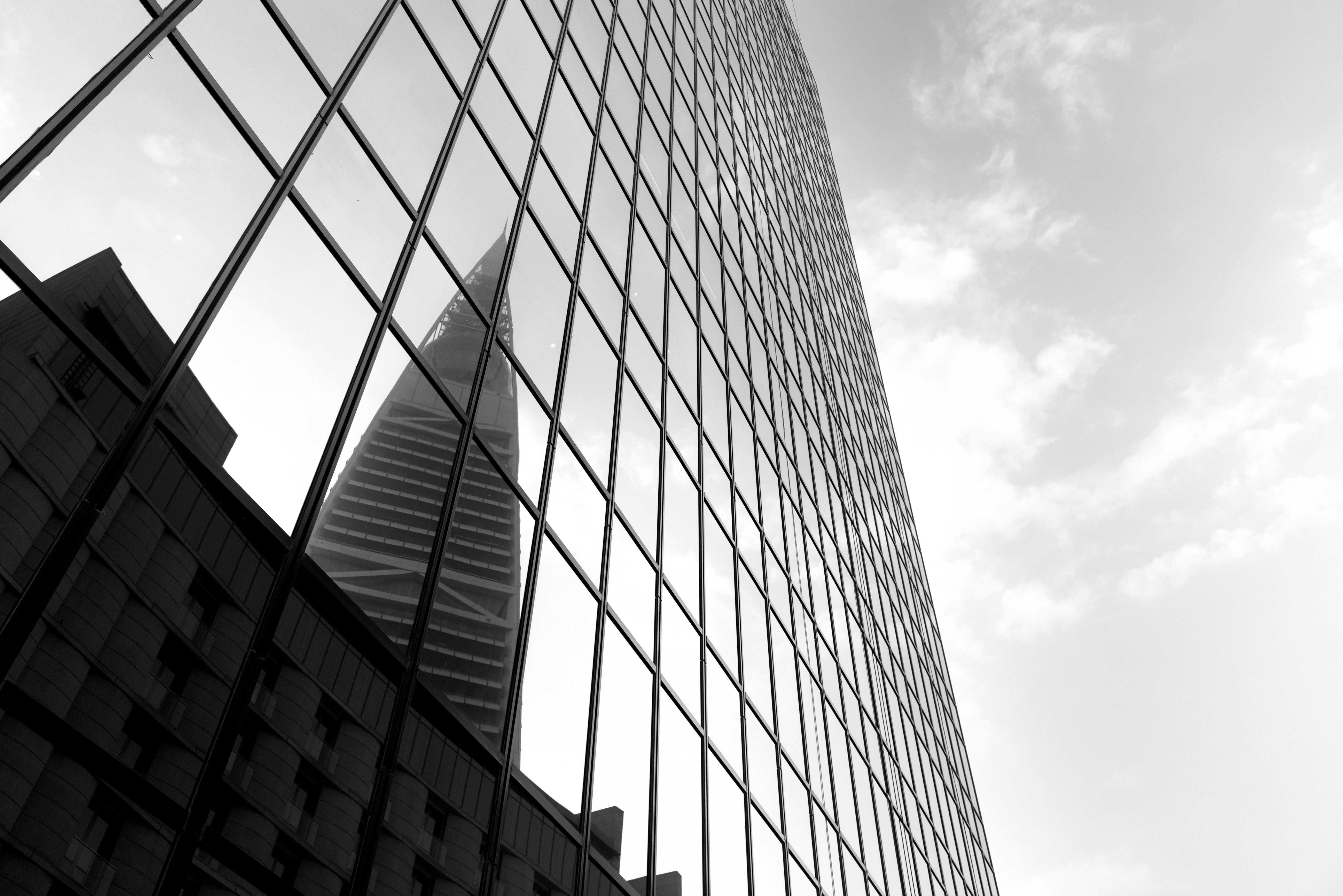 Modern skyscraper reflection in glass building