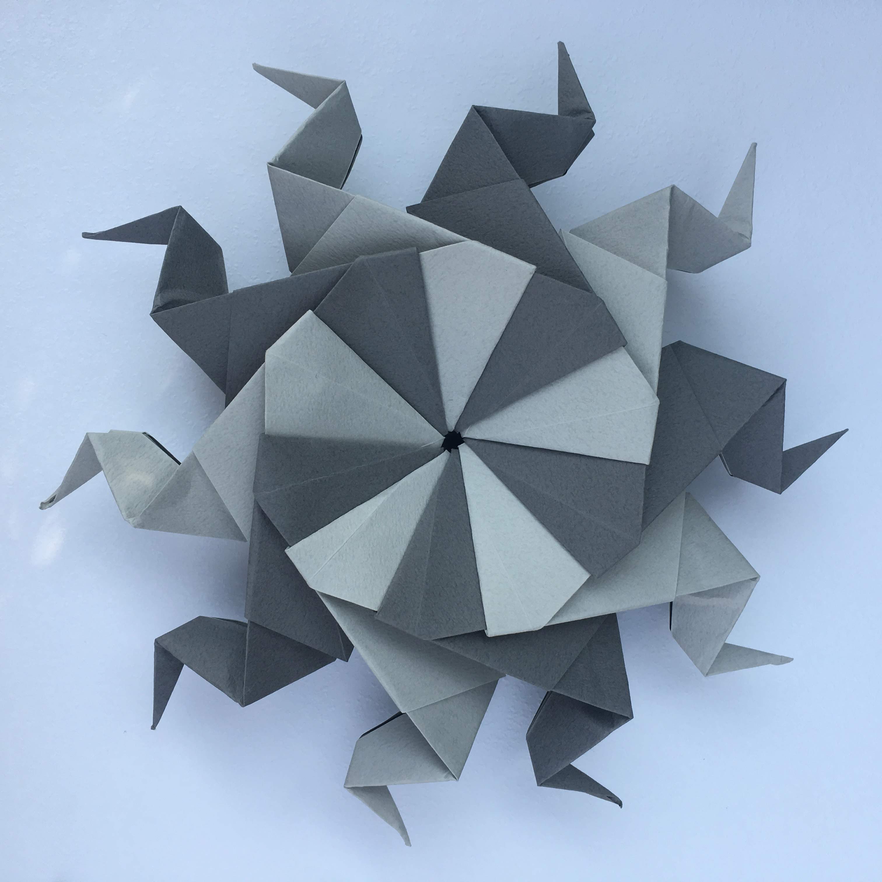 a group of people walking on a sidewalk