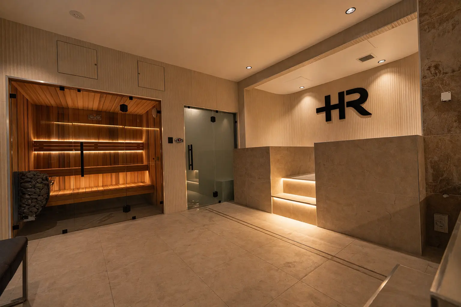 a sauna room with a sauna in the middle of it