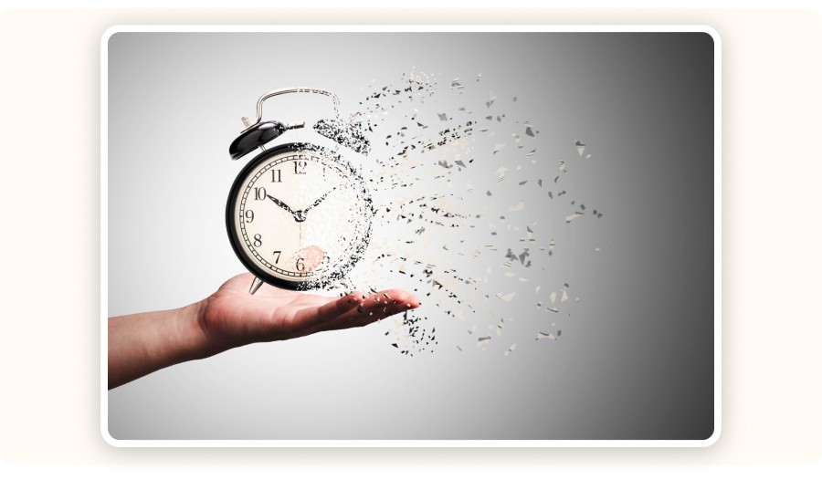 Hand holding alarm clock dissolving into fragments, symbolizing time passing quickly