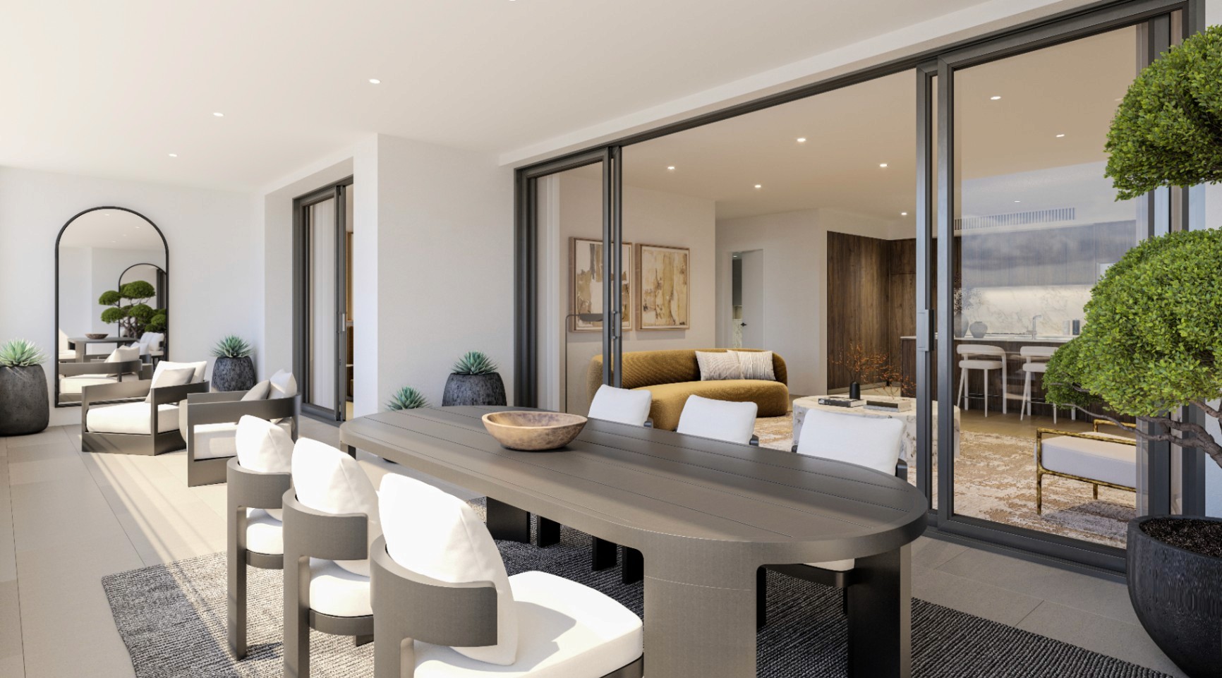 Spacious apartment balcony at Kew Tallawong opening to a modern living area with indoor-outdoor flow, contemporary finishes, and abundant natural light.