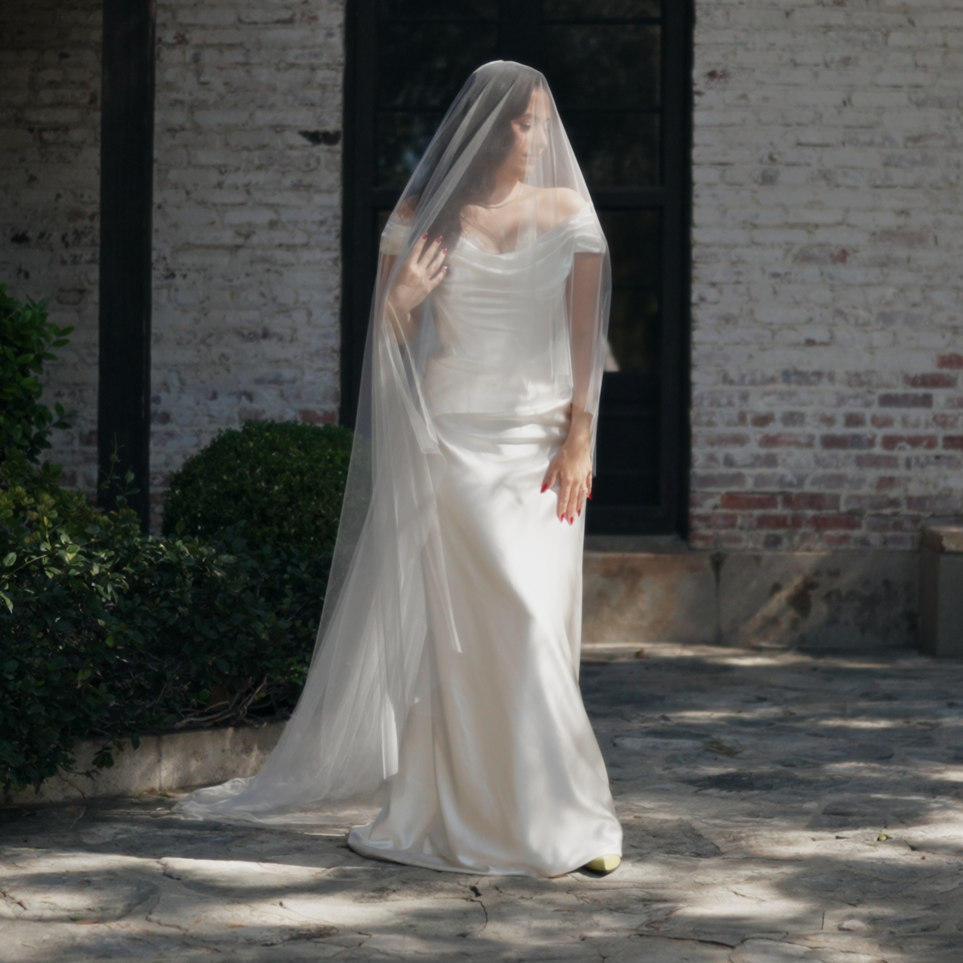 man holding gold ring on woman's finger