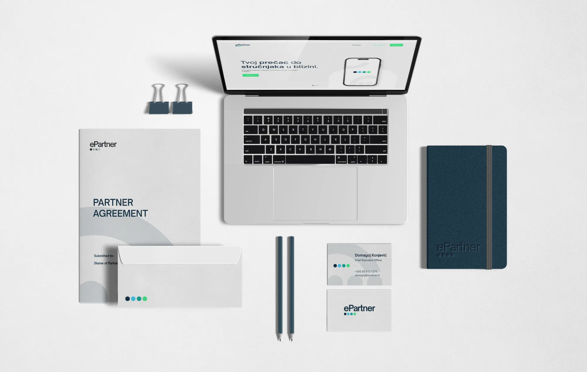 A comprehensive corporate stationery mockup by Studio Liminal displaying branded contracts, envelopes, and business collateral alongside a laptop showing the ePartner tech platform homepage.
