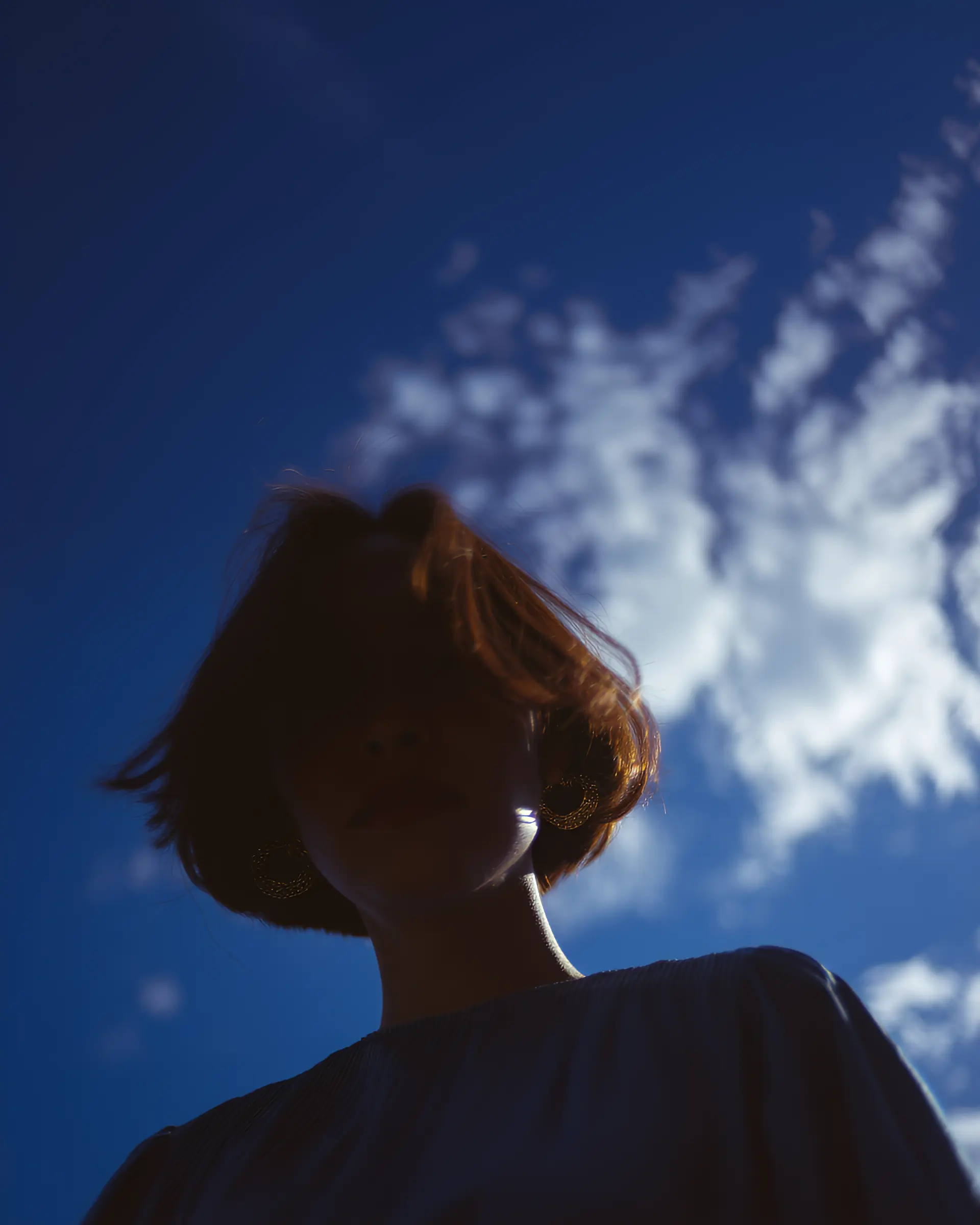 Portrait of a woman with sunlight from behind