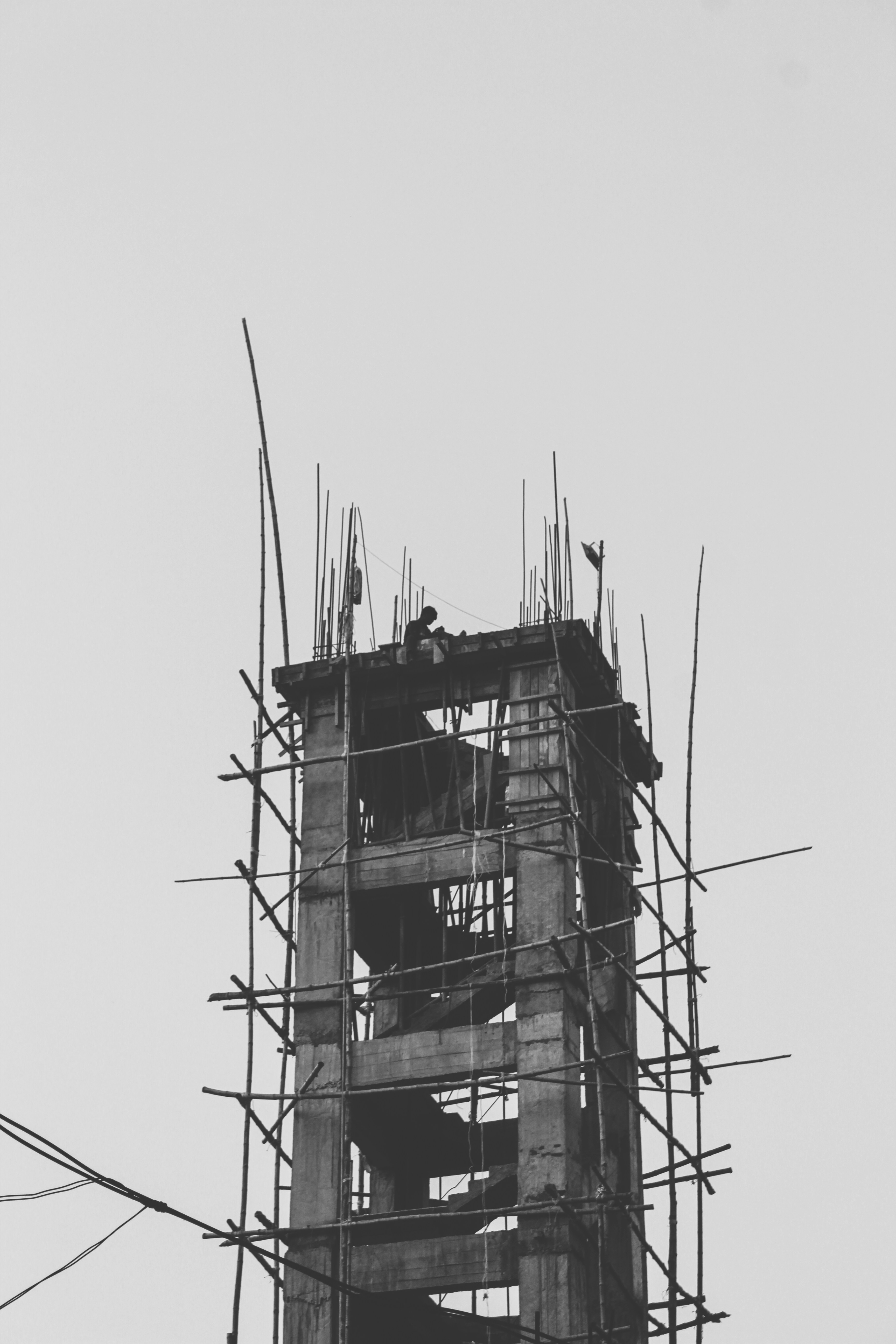 a tall tower with scaffolding on top of it
