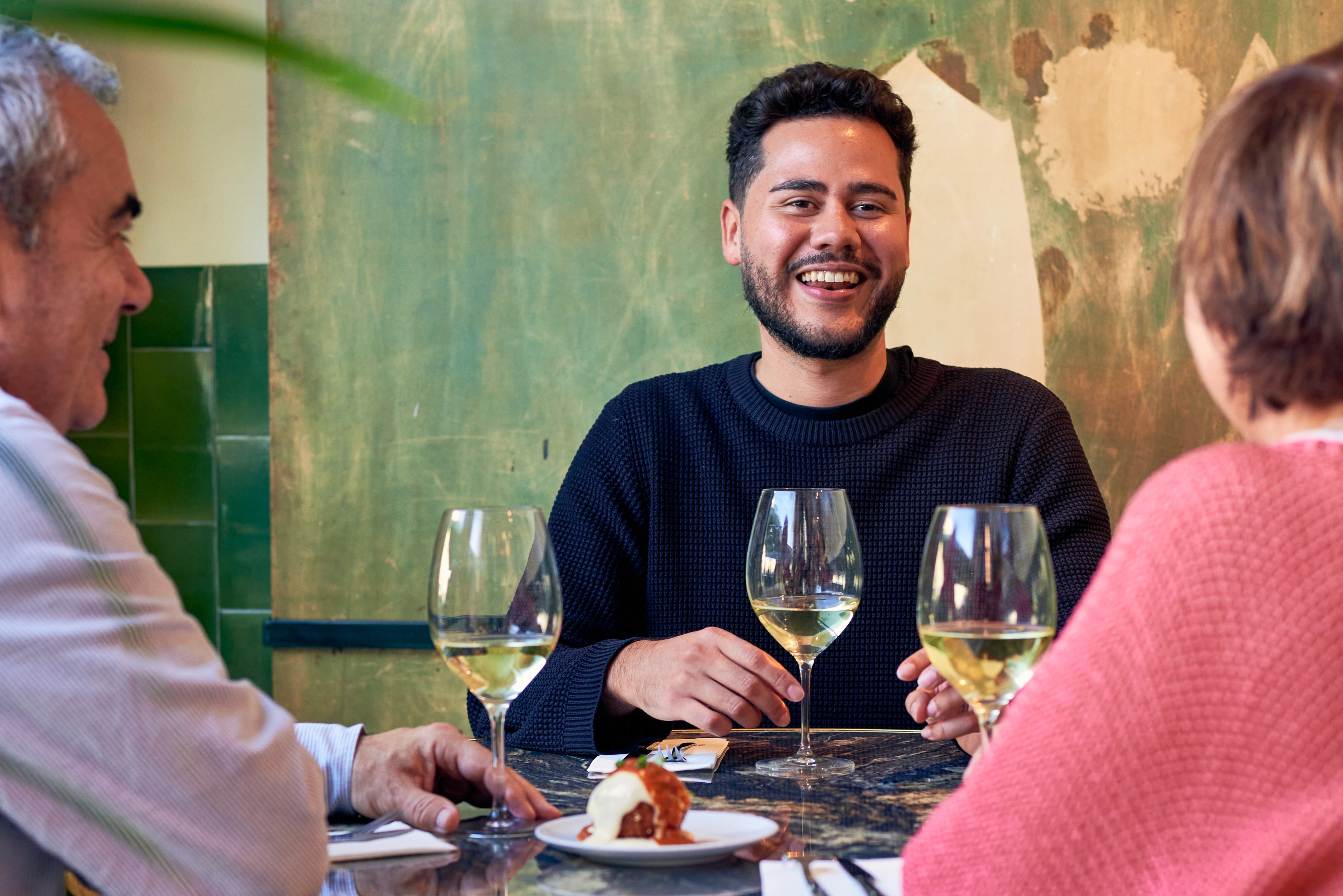 Sommelier guiding guests during a small-group wine tasting experience in Barcelona.