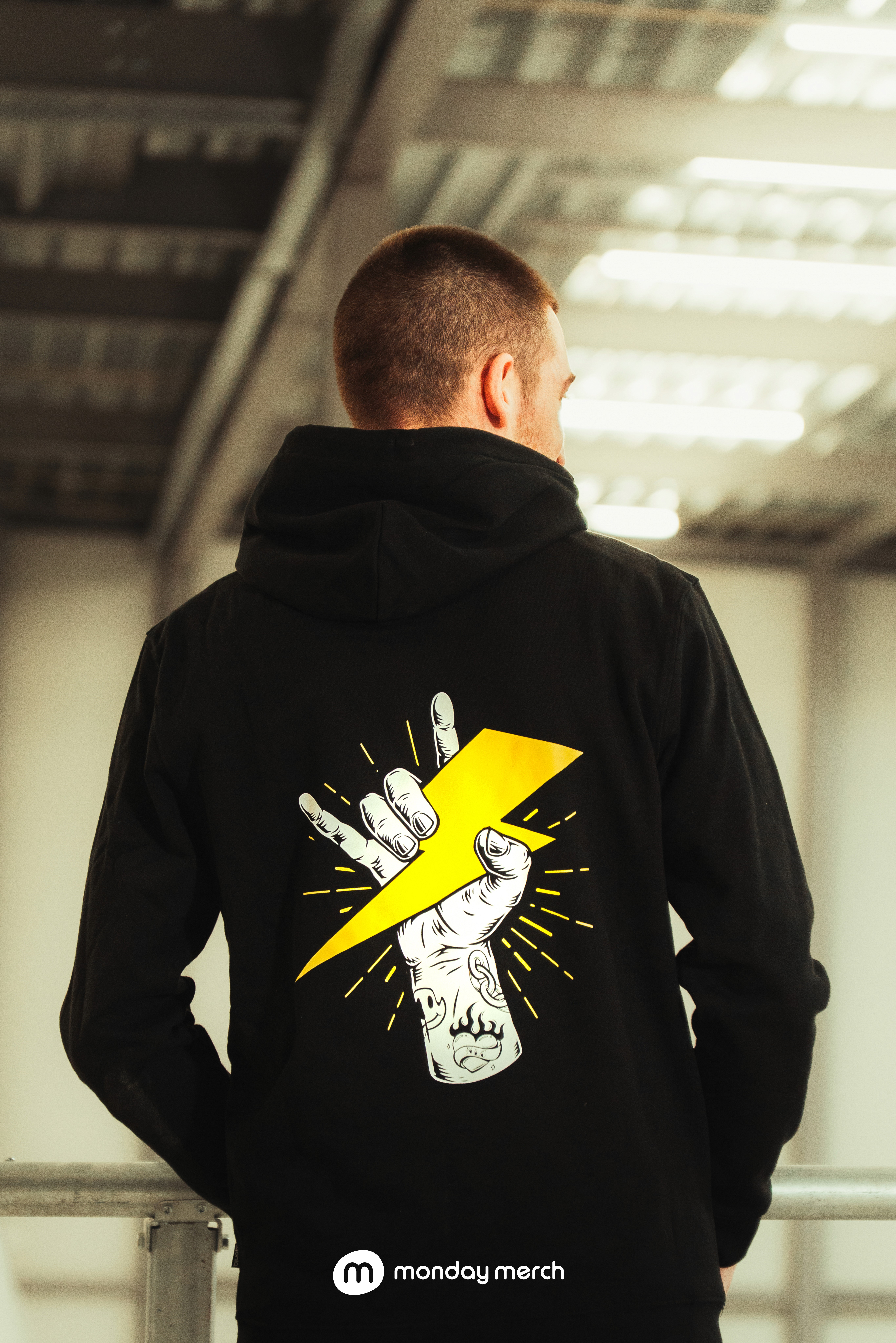  two black water bottles with bold white prints on each.