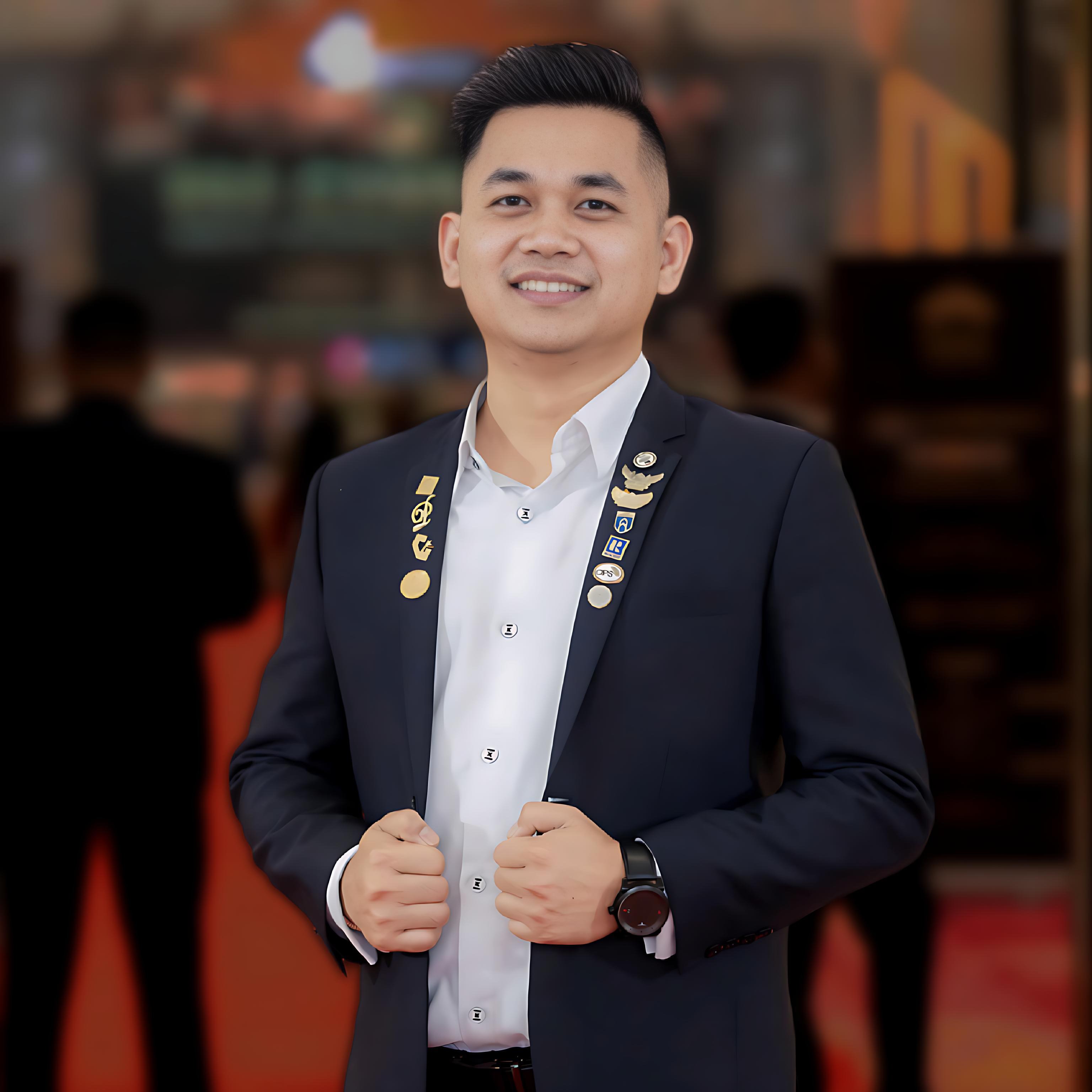 Professional headshot of Peter Chy, International Licenced REALTOR® and Cambodia luxury real estate advisor.