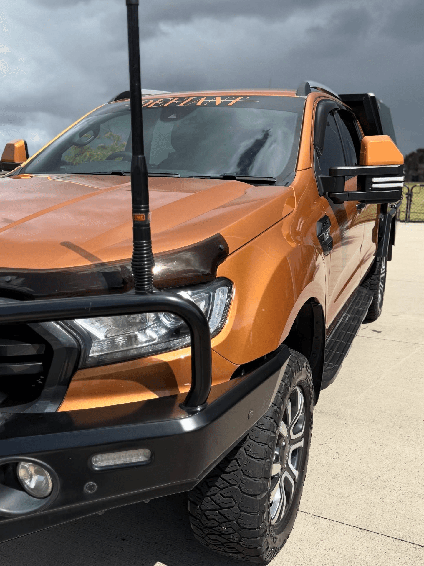 gray scale photo of a person's feet on a football