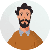 青いボタンアップシャツの男性