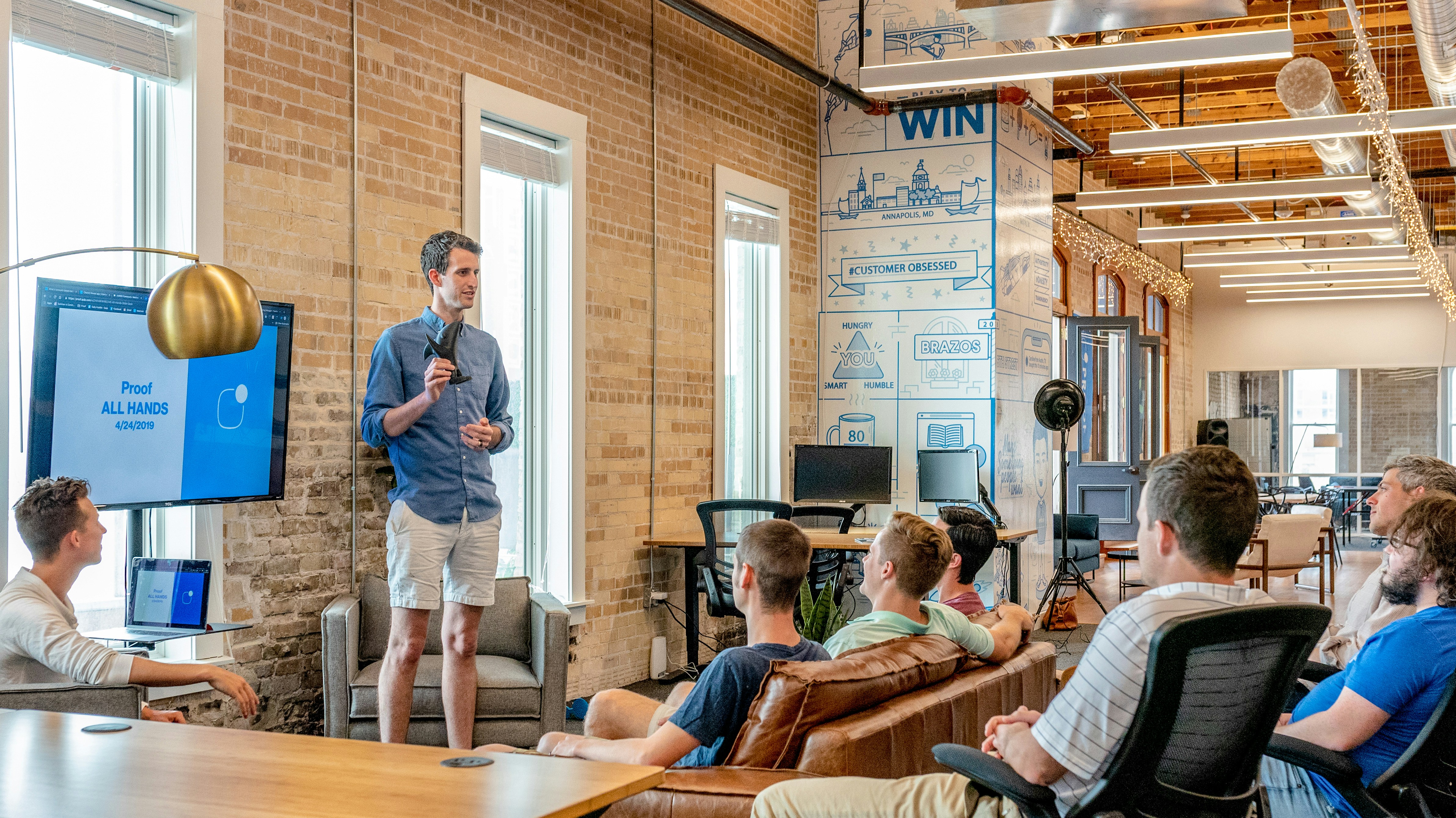 Business team collaborating in a meeting room to drive company growth and success