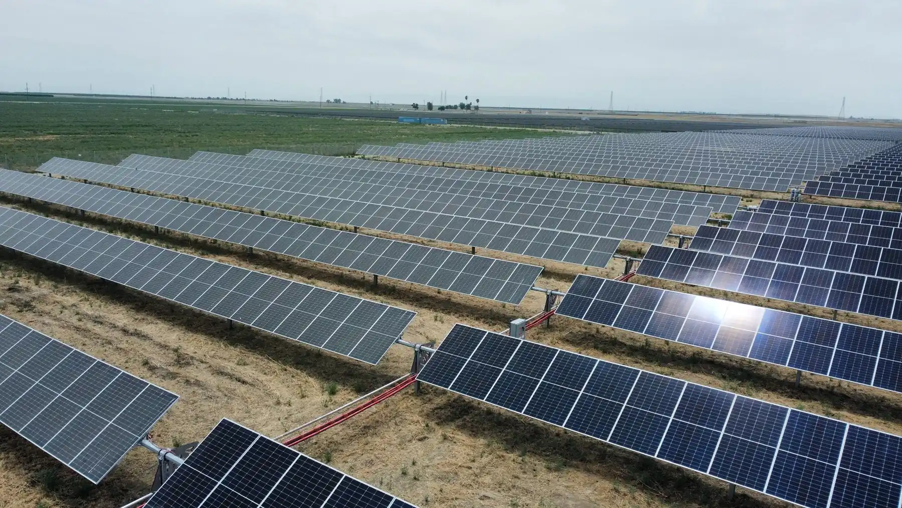 Drone view of a utility-scale solar farm in California's Central Valley | Premier Solar Service, serving Tracy, CA