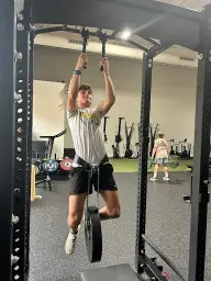 man in black hoodie standing