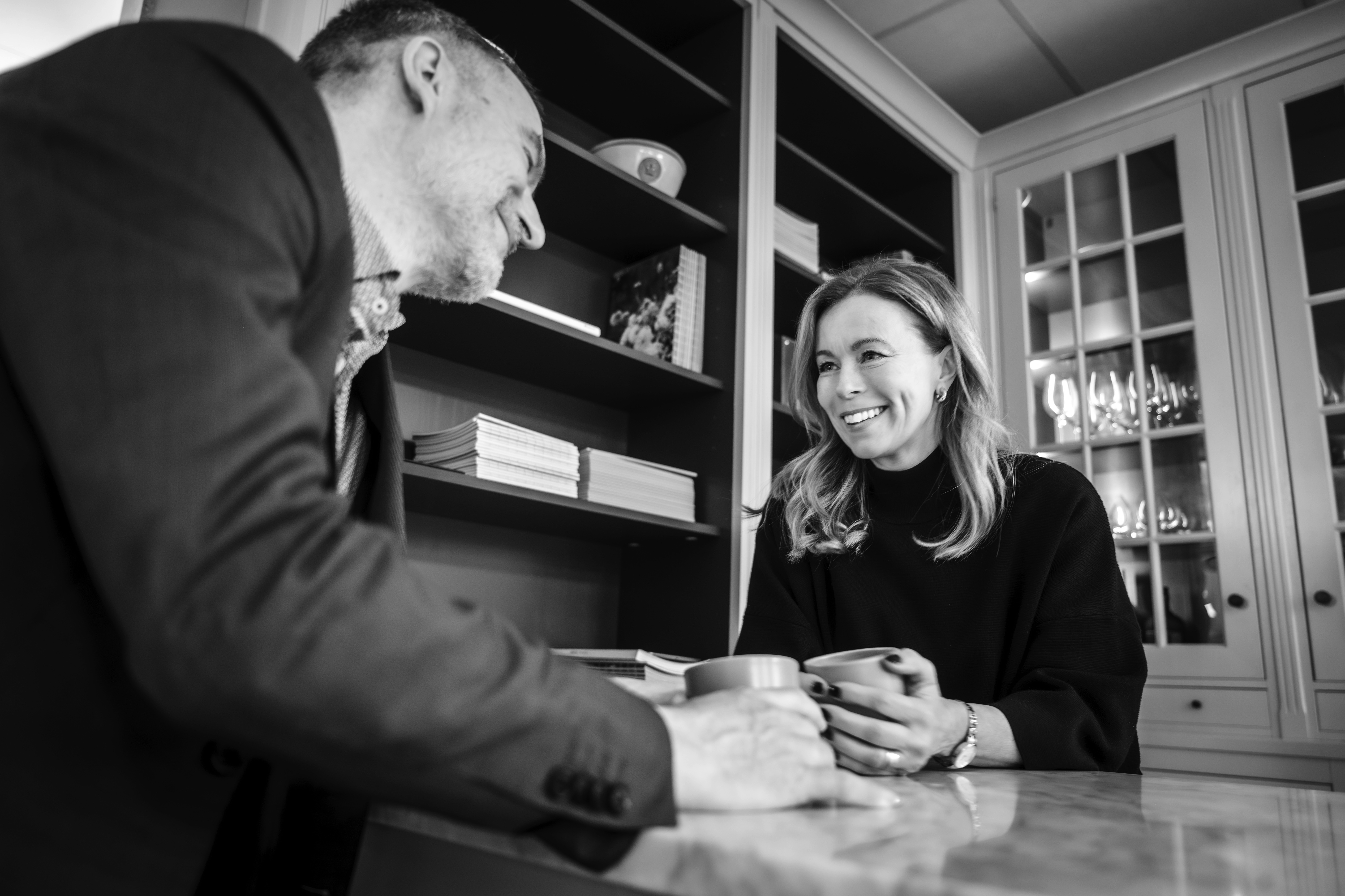 a man in a yellow shirt is on a red track