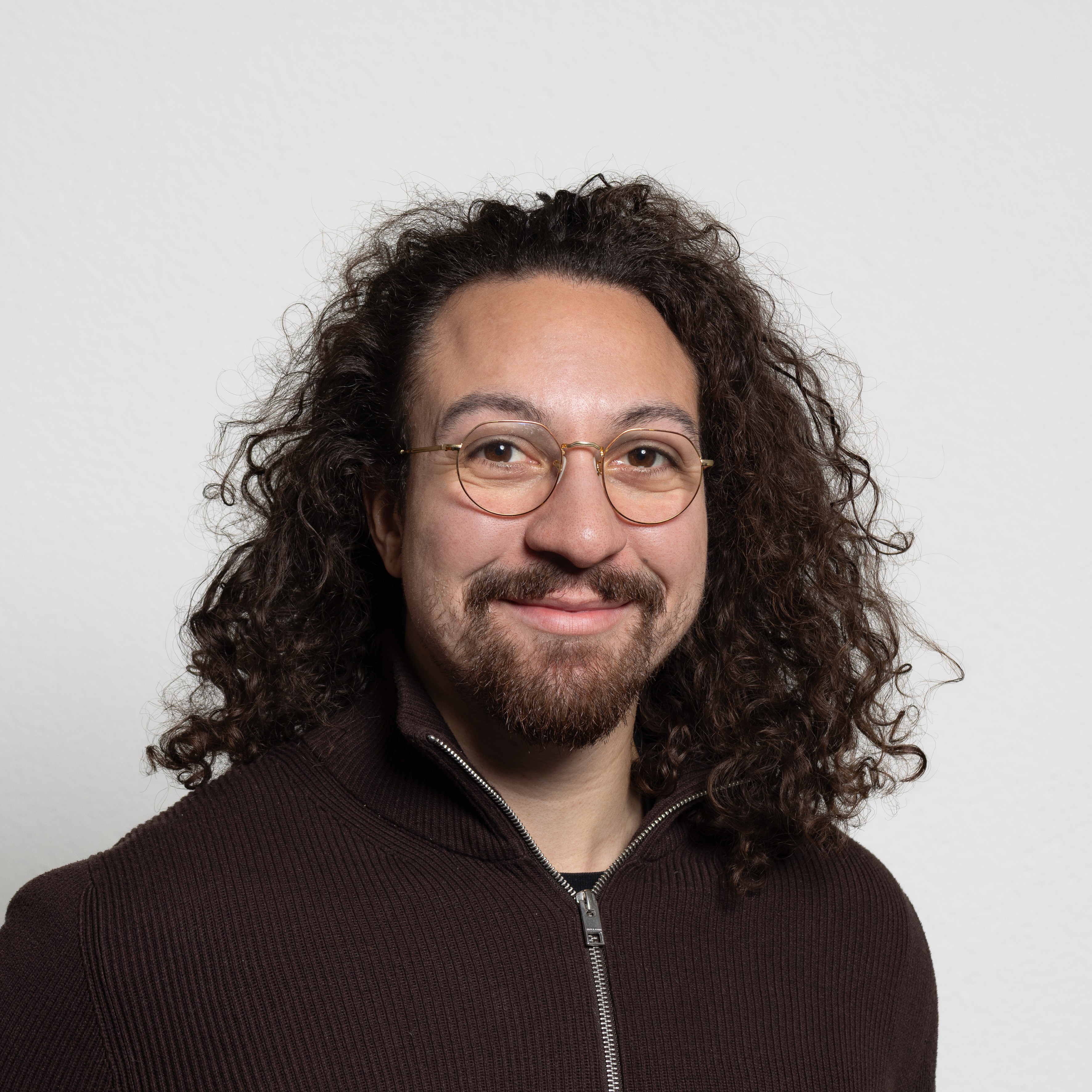 woman in white crew neck shirt smiling