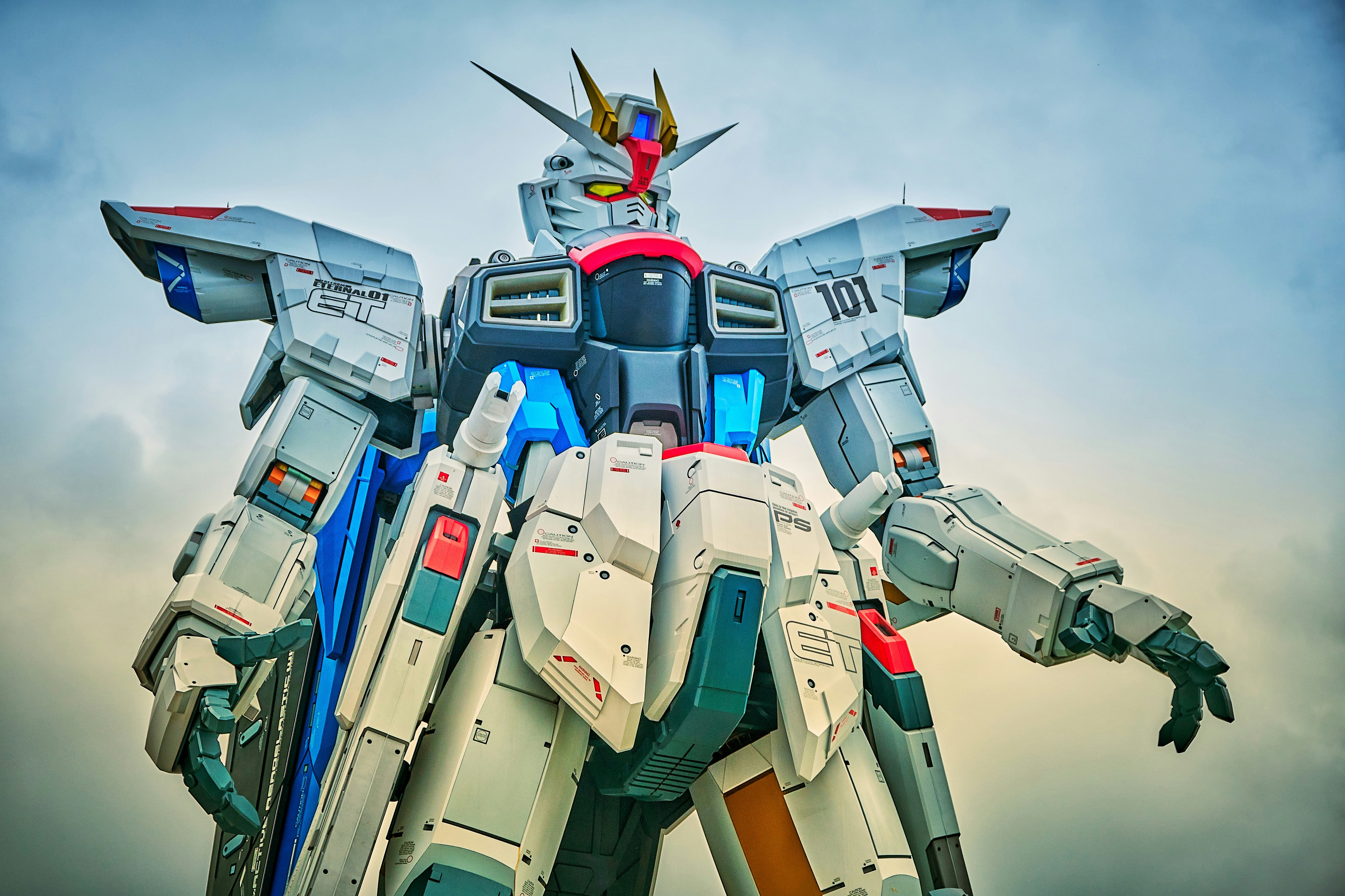 A close up image of a Gundam mech robot