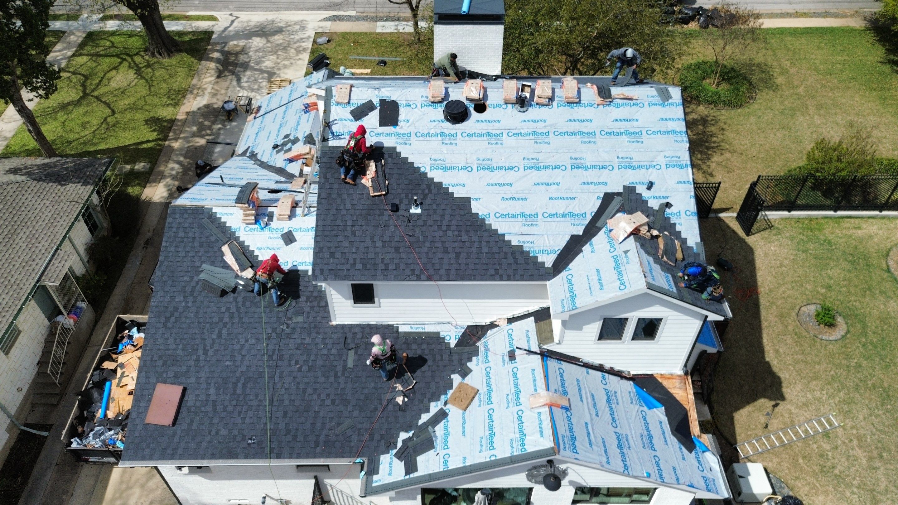 In progress stage of the roof replacement job in Dallas