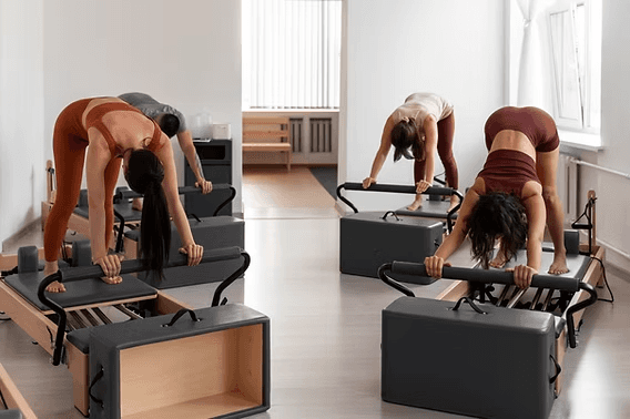 Pilates Reformer Leg Exercises - elephant on hamstring calf