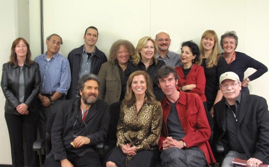 A group photo showing people smiling.