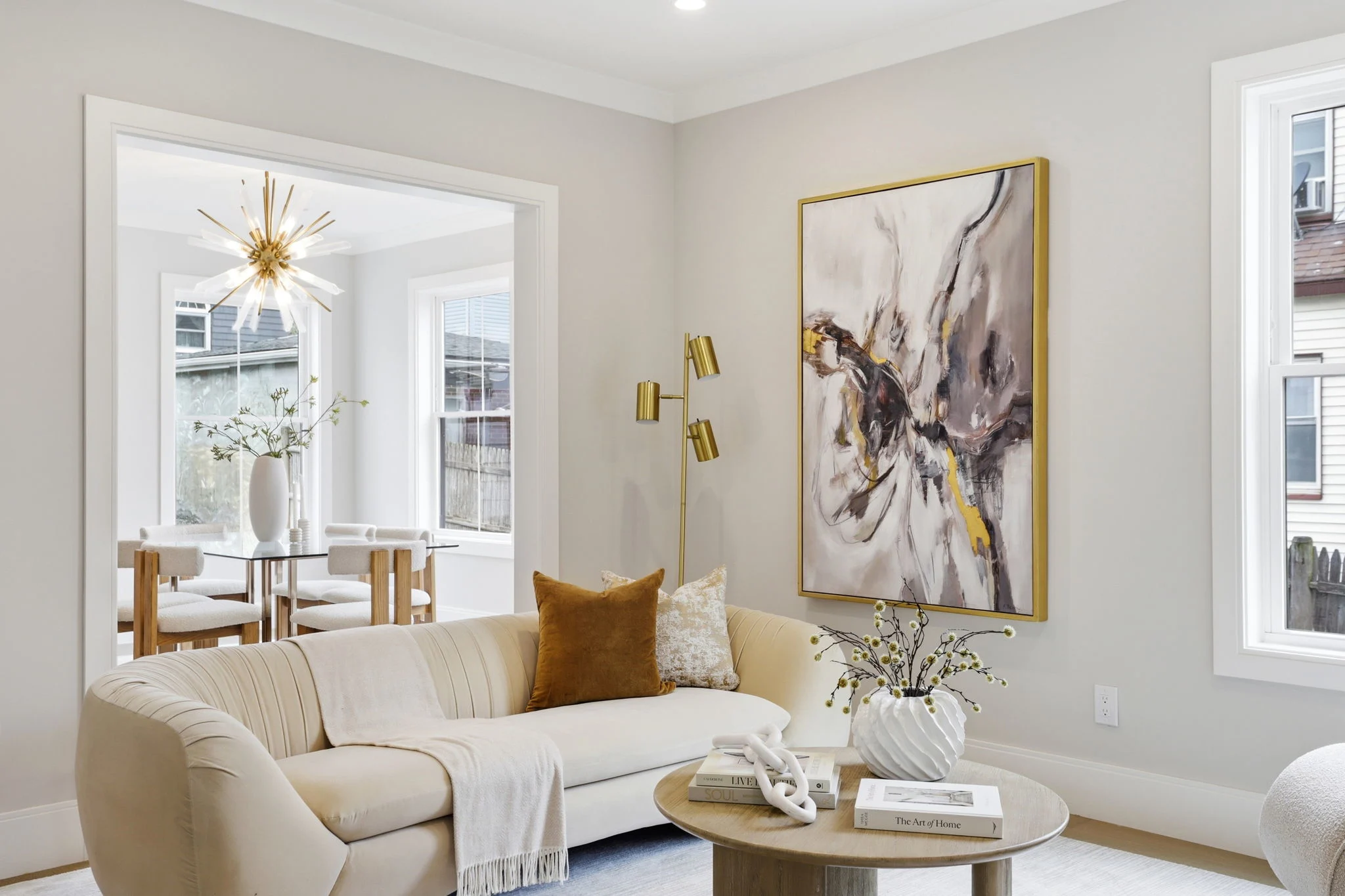 Bright modern living room with grey velvet sofas