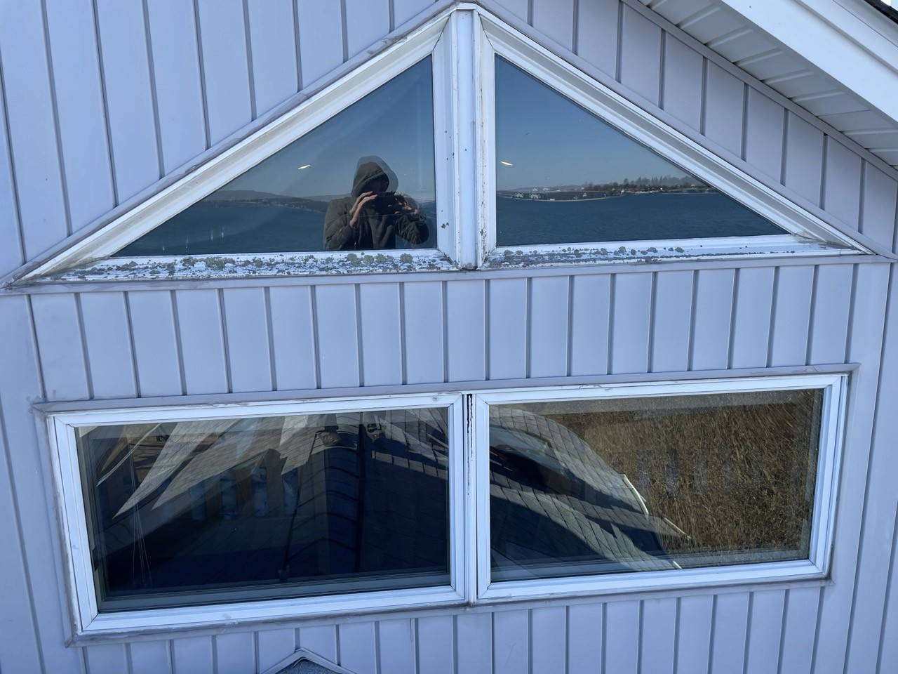 Extensive water damage around the old window