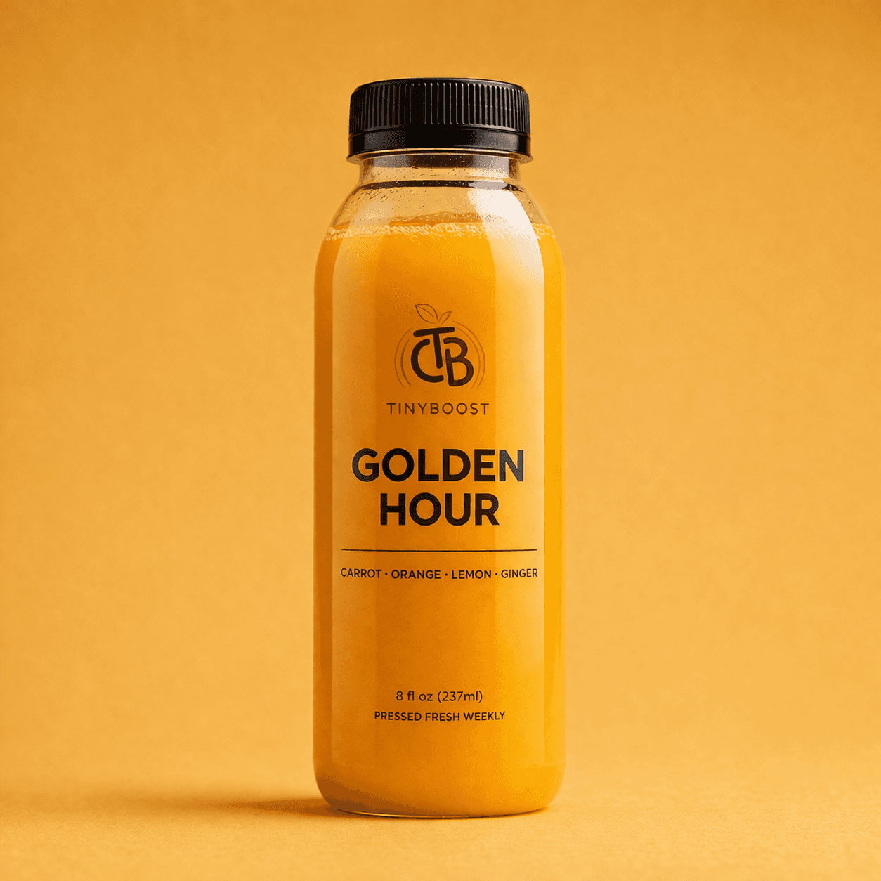 Golden Hour golden cold-pressed juice bottle by TinyBoost.