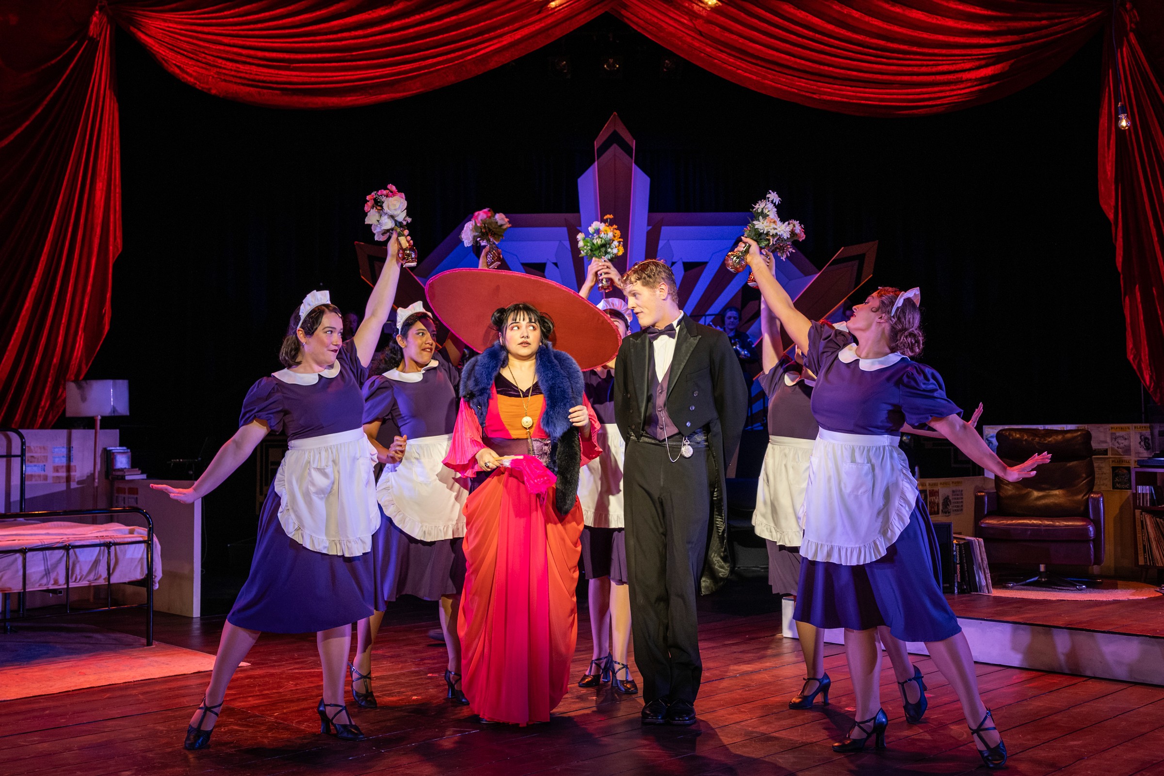 Mrs Tottendale and Underling surrounded by the 5 house staff