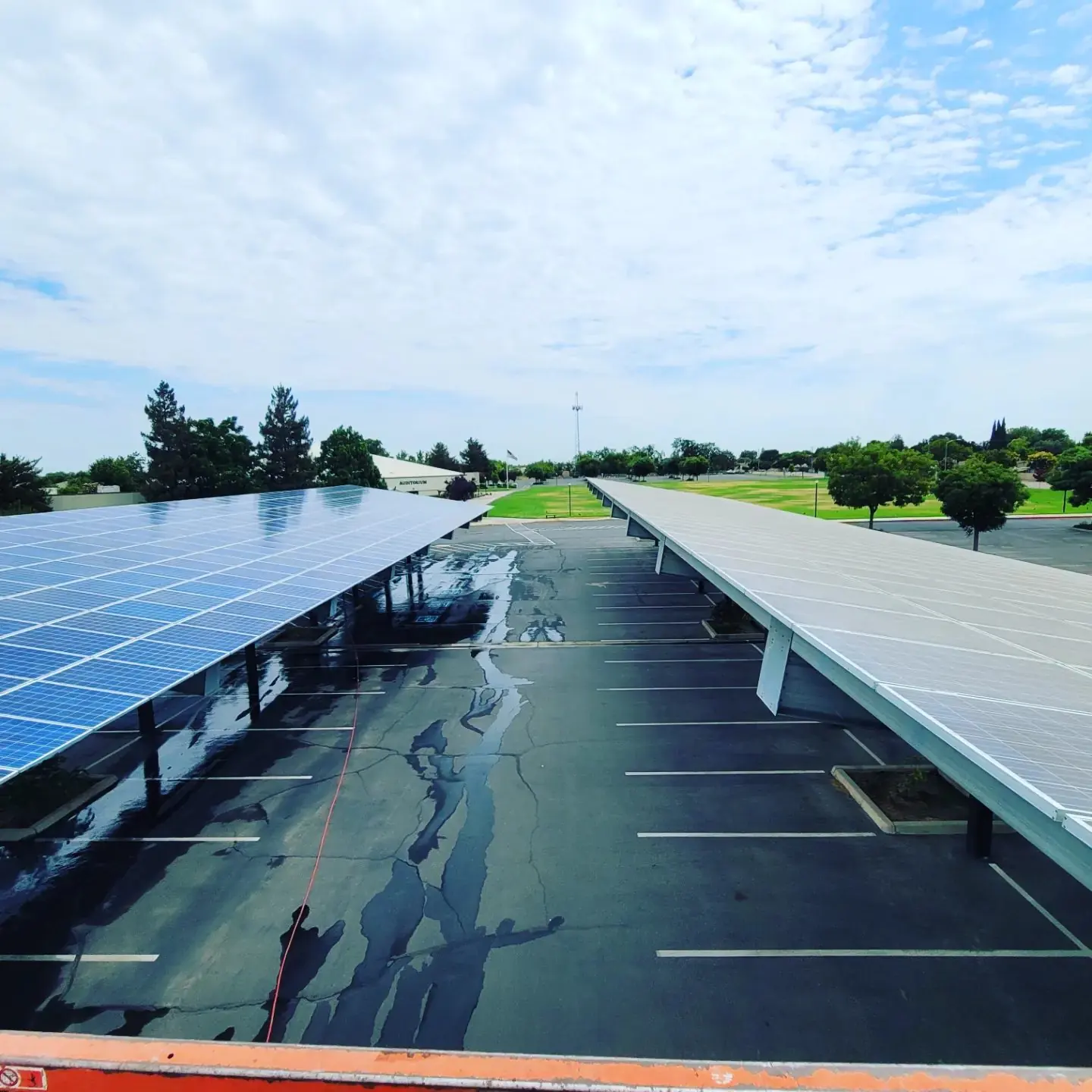 Commercial solar carport over a parking lot after cleaning | Premier Solar Service, serving Tracy, CA
