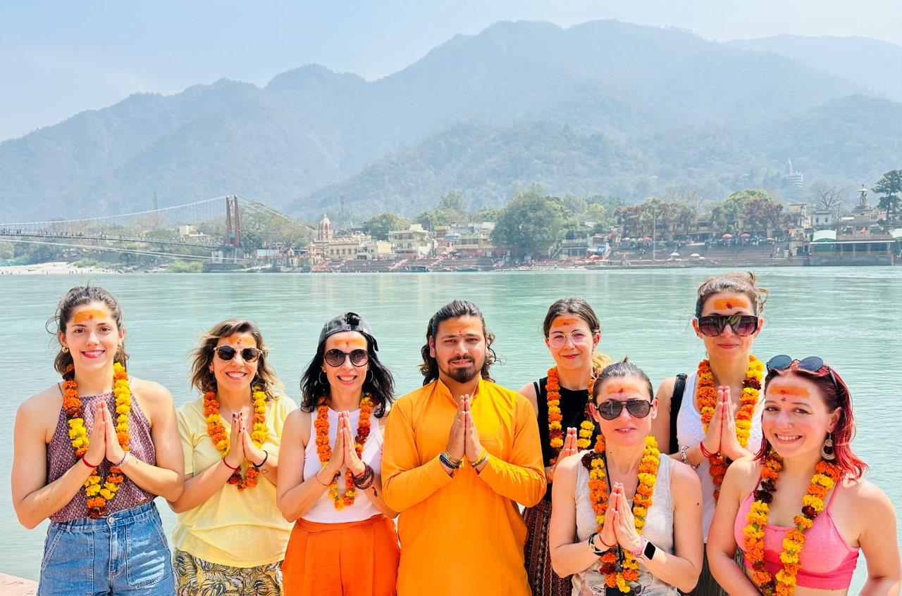 students with their yoga teacher