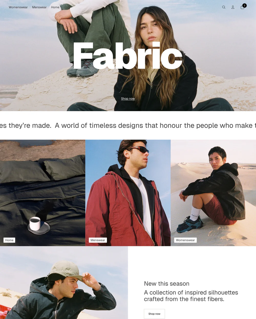 A screenshot of a website with A woman with long hair sits on a sandy mound beside a seated person. The word "Fabric" overlays the image. The tone is calm and contemplative.