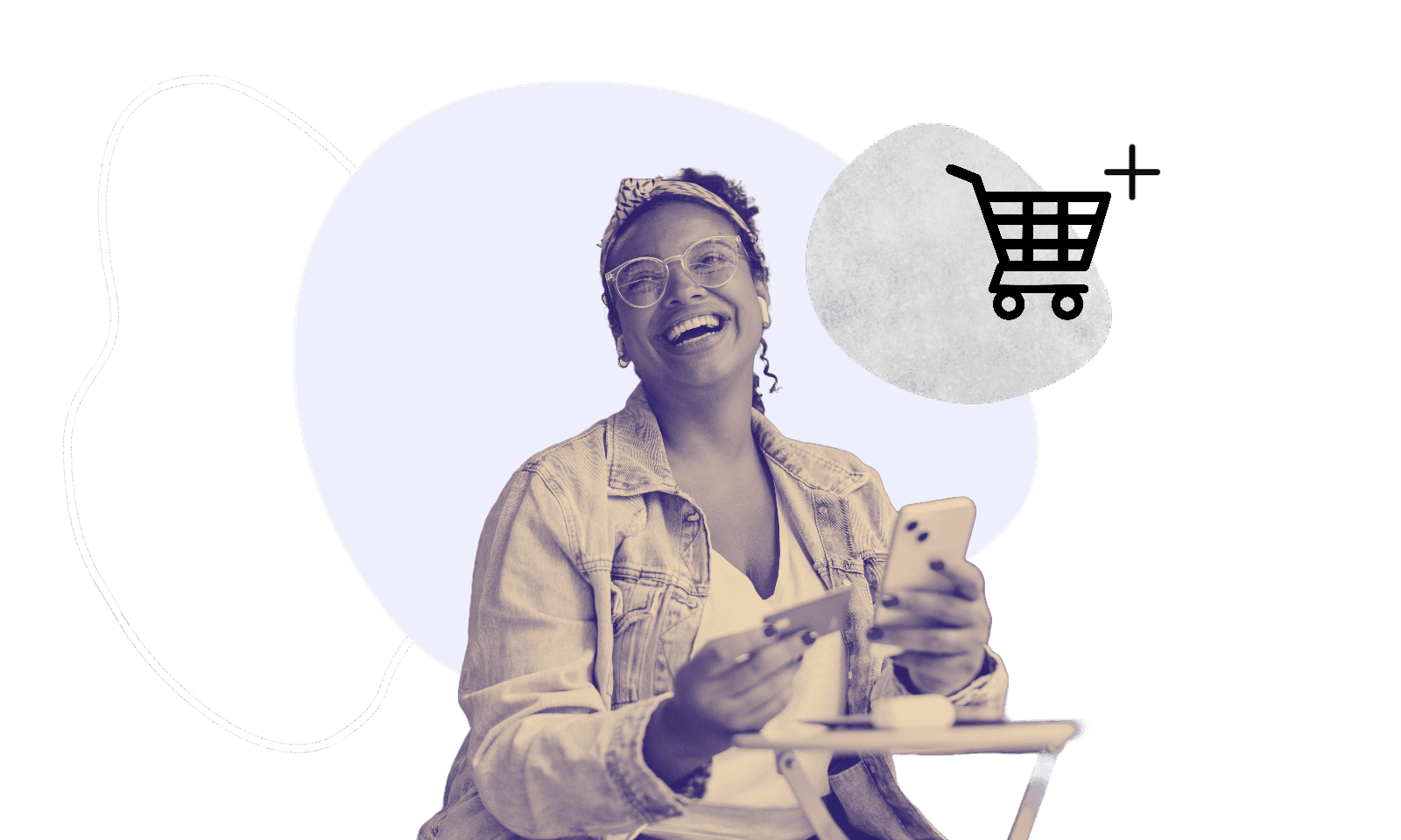 Woman laughing at camera holding a phone and credit card. Shopping trolley symbol to the right of her head