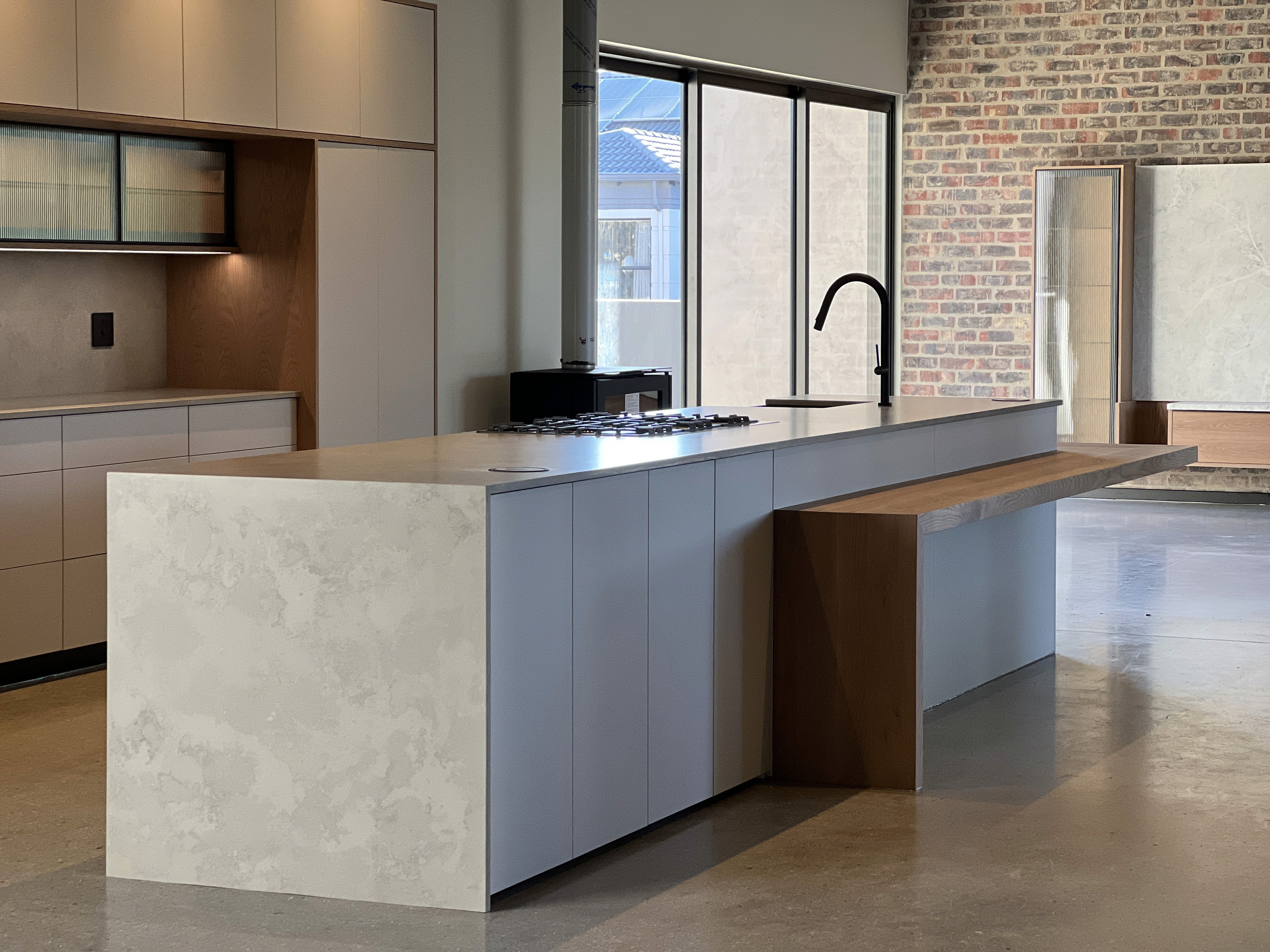 Contemporary wooden architecture featuring natural cedar cladding and floor-to-ceiling glazing