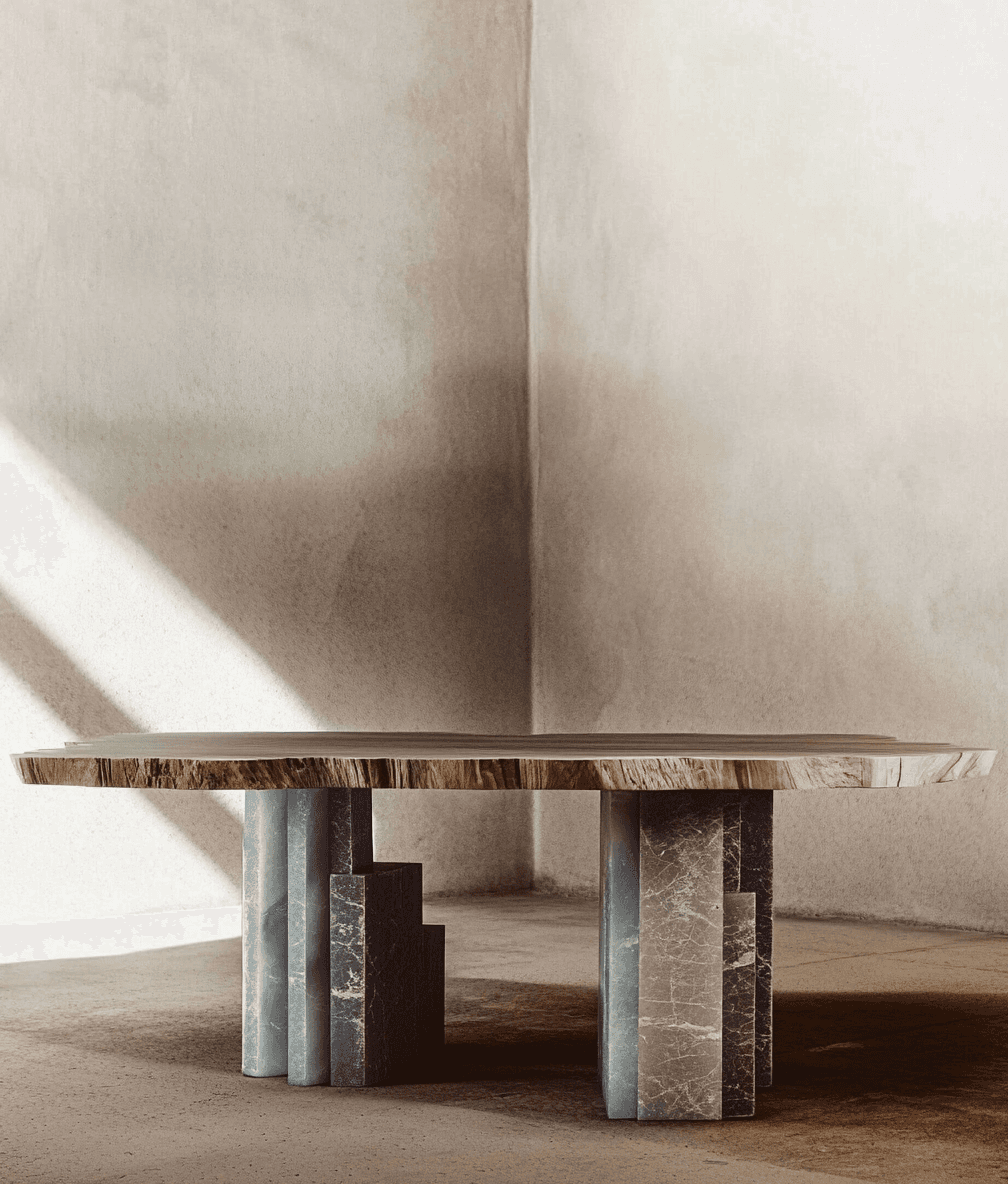 Vistara Table body_ Precision-cut, polished  Acquamare Quartzite with subtle vein_ Live  Edge Oak wood Table top_Sleek, polished  Stainless Steel metal Joints: Quartzite Legs_ Hand-peened Wooden  dowels with Stone inserts, visible M8-10 MS  threaded black connectors, base to top