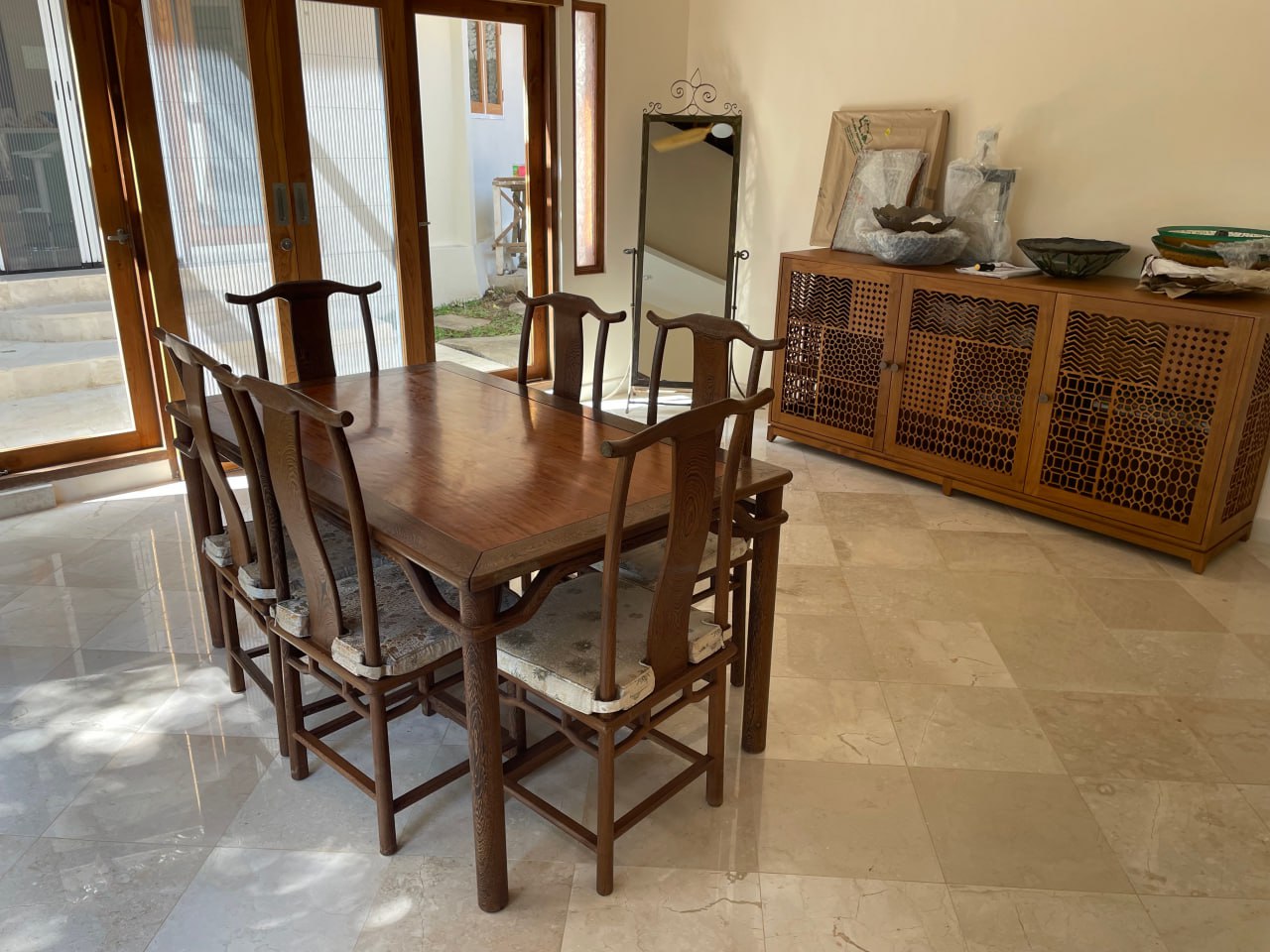 A 4-bedroom villa in a gated complex in Nusa Dua, featuring a large private garden and a peaceful residential environment