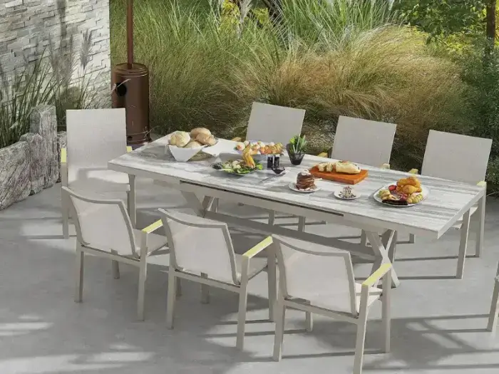 Contemporary 8-seater patio dining set with grey table and modern outdoor chairs.