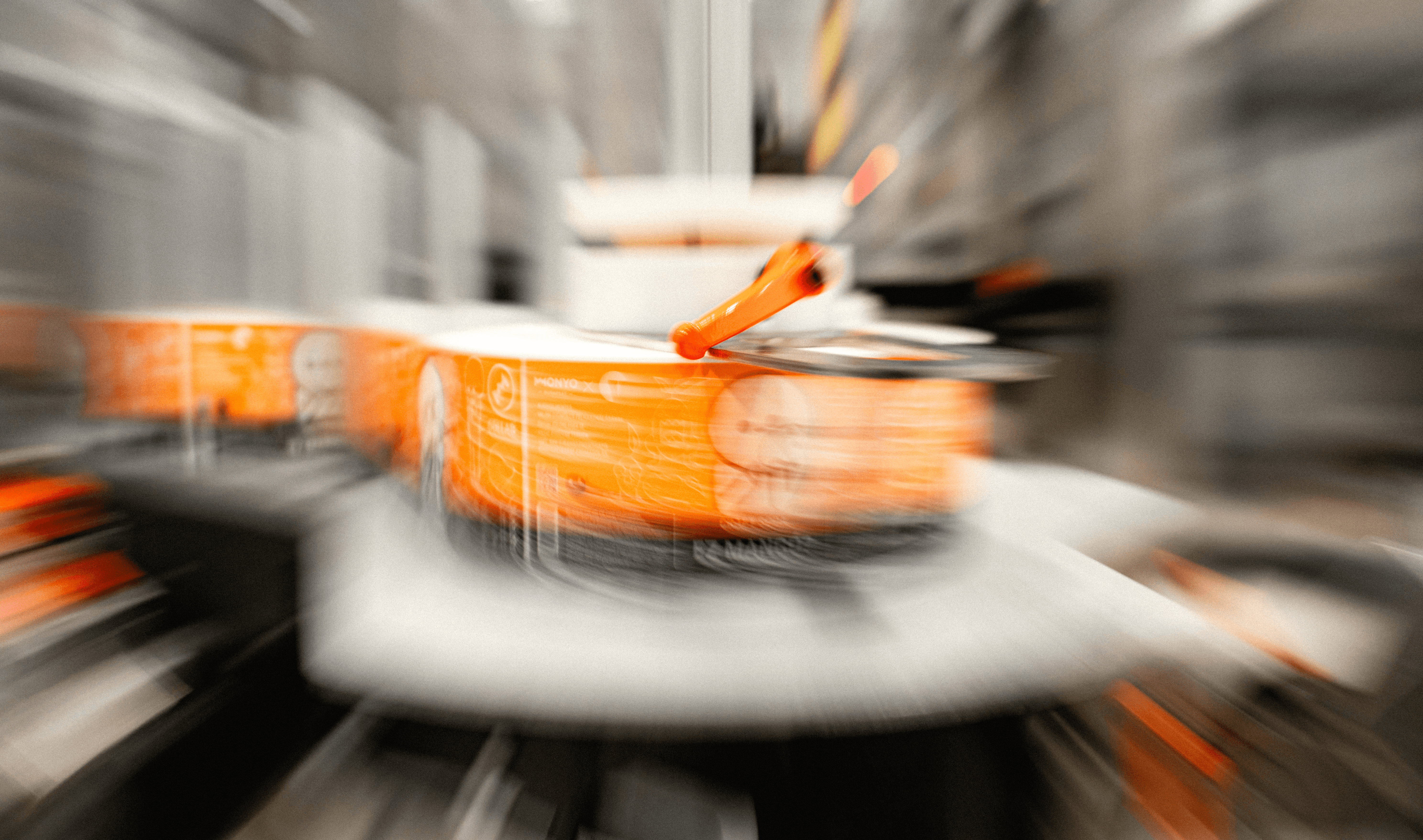 The team working together at a table with laptops, discussing business strategies or projects.
